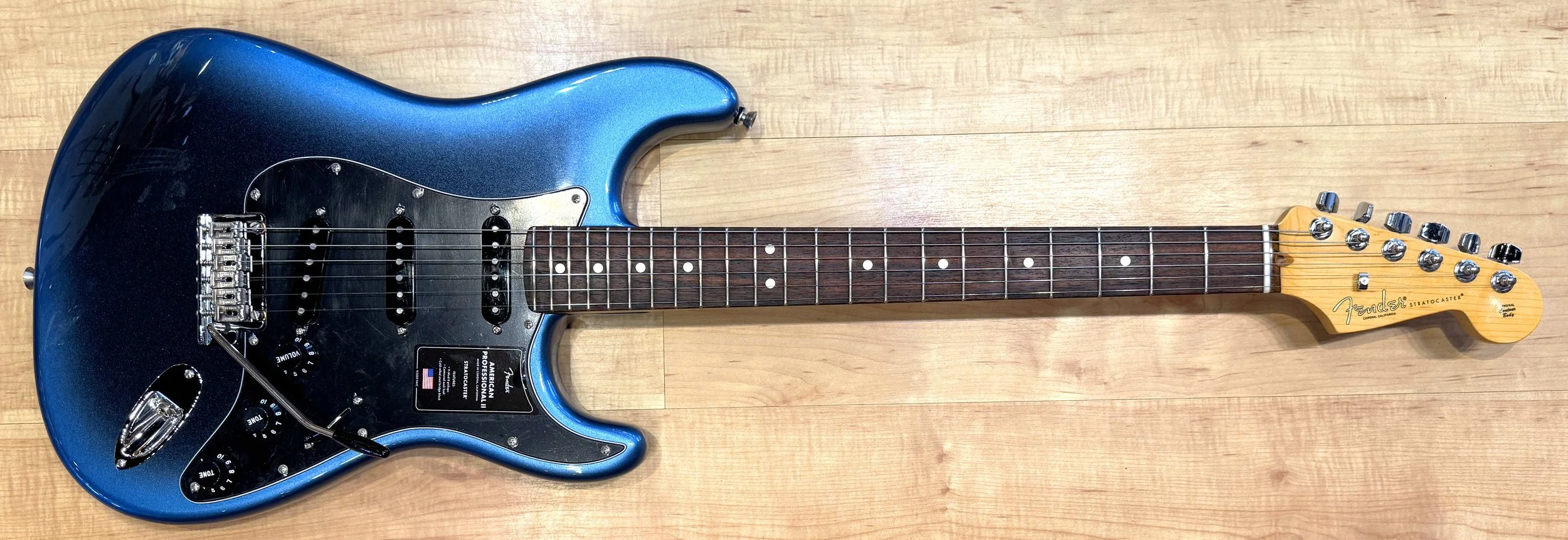 Front of the Fender American Professional II Stratocaster Electric Guitar In Dark Night