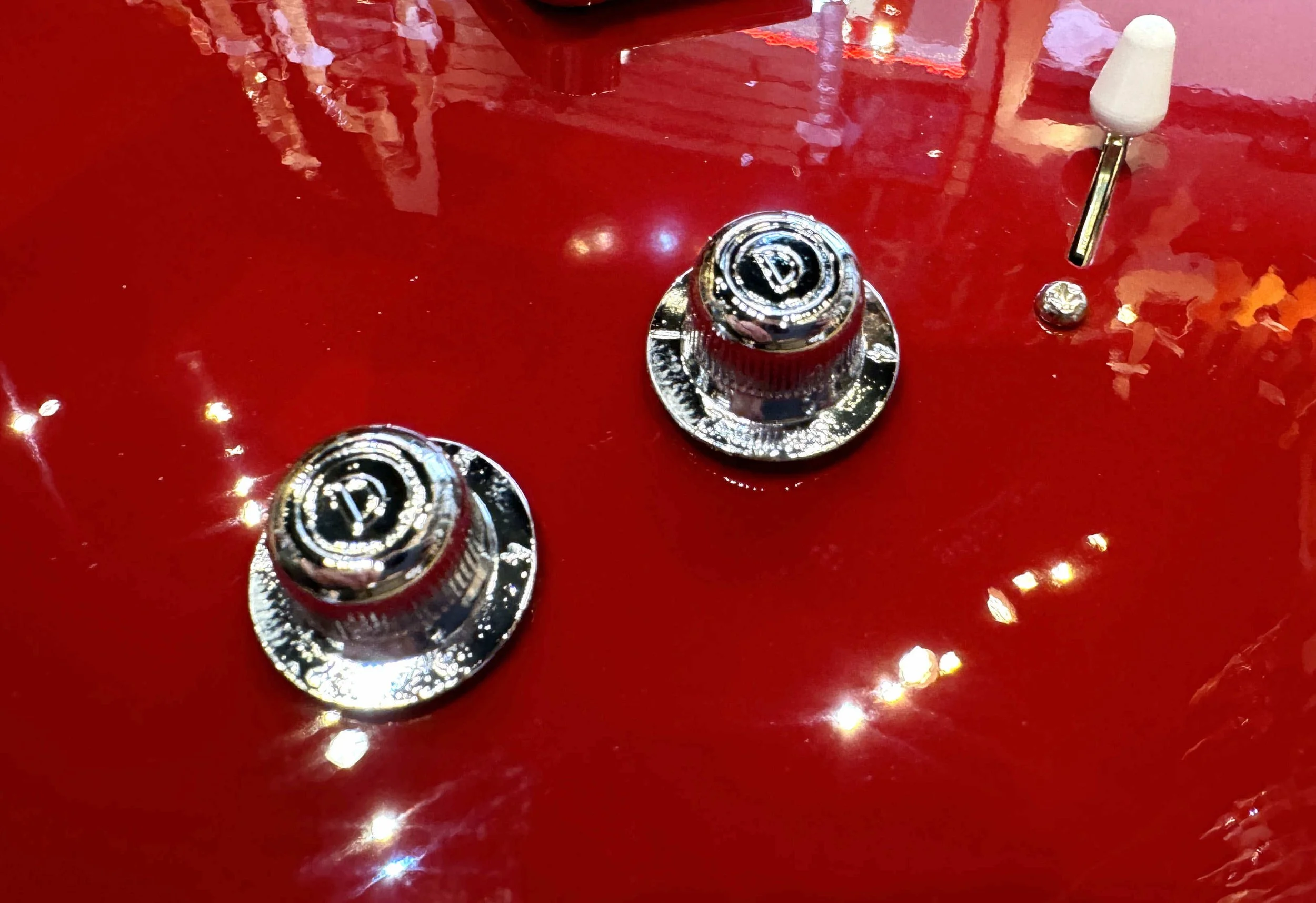 Tone controls of the Danelectro '59 Triple Divine Semi-Hollow Electric Guitar In Red