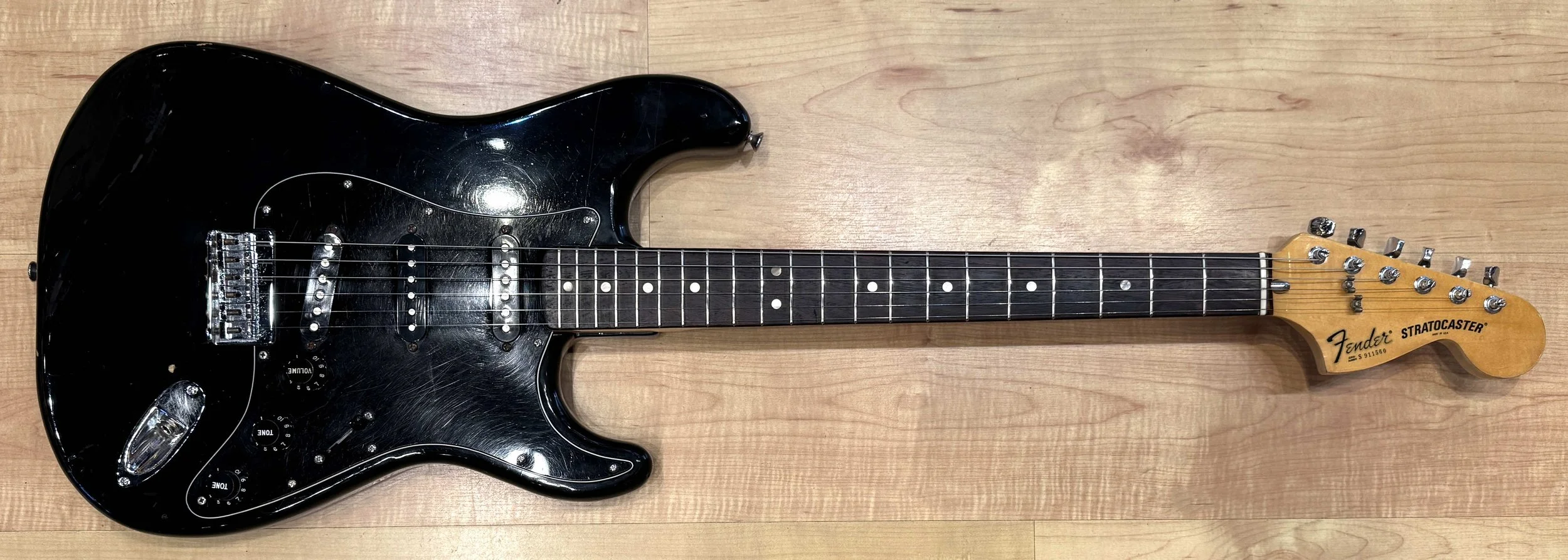 Front of the Vintage 1979 Fender Stratocaster Hardtail Electric Guitar In Black