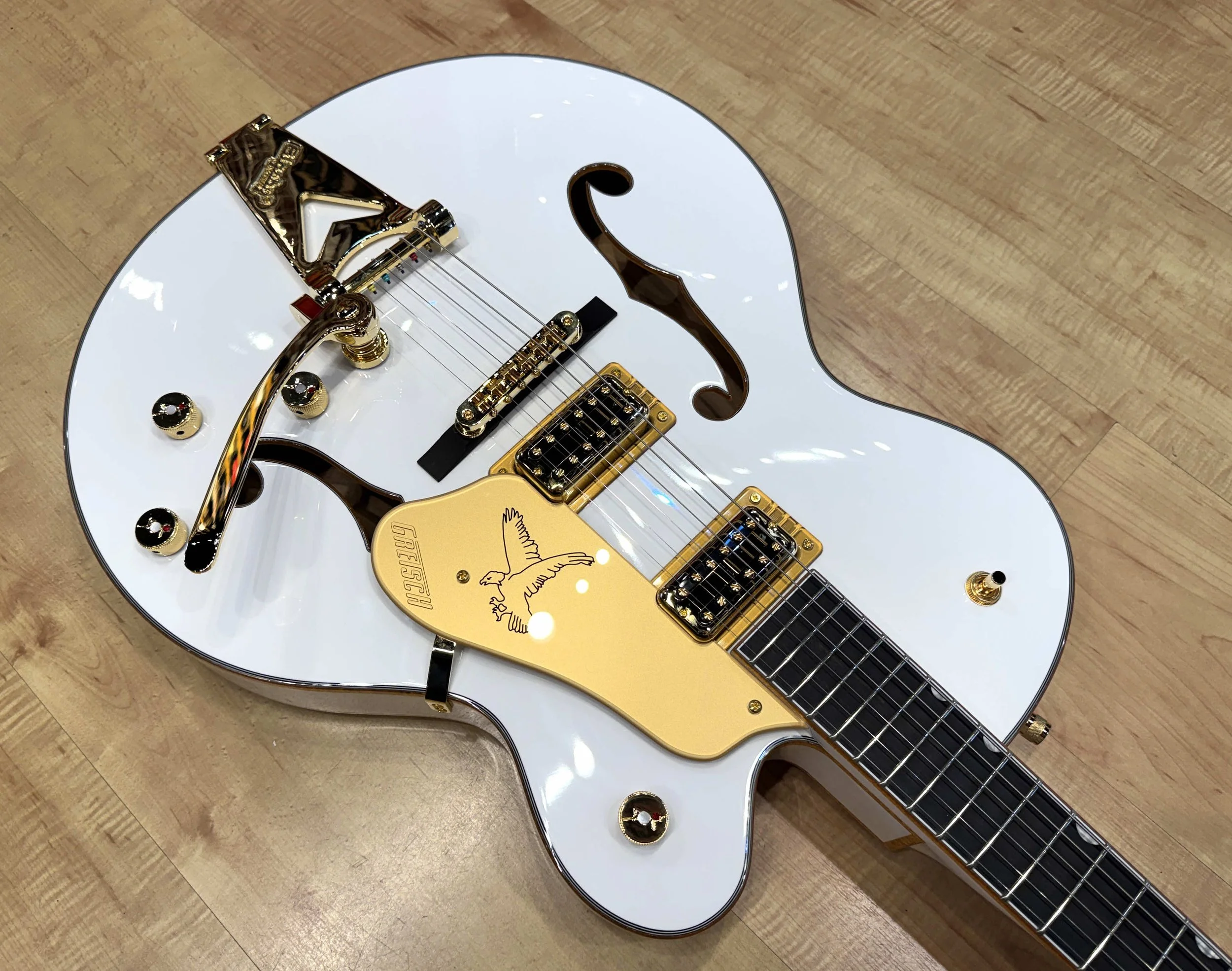 Hardware of the Gretsch Synchromatic Falcon Hollow Body Single-Cut Electric Guitar with Bigsby (White)