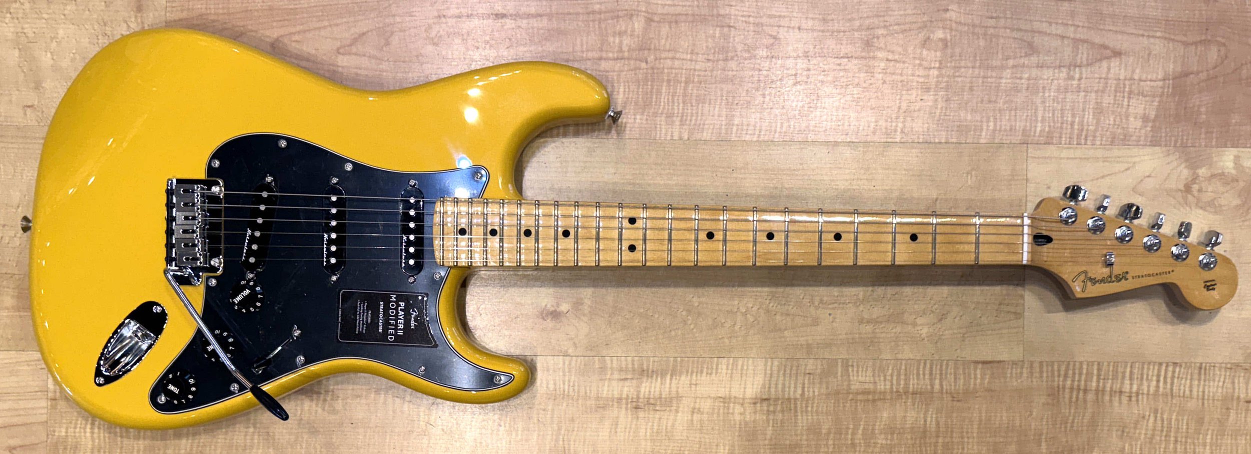 Front of the Fender Player II Modified Stratocaster Electric Guitar In Sunshine Yellow
