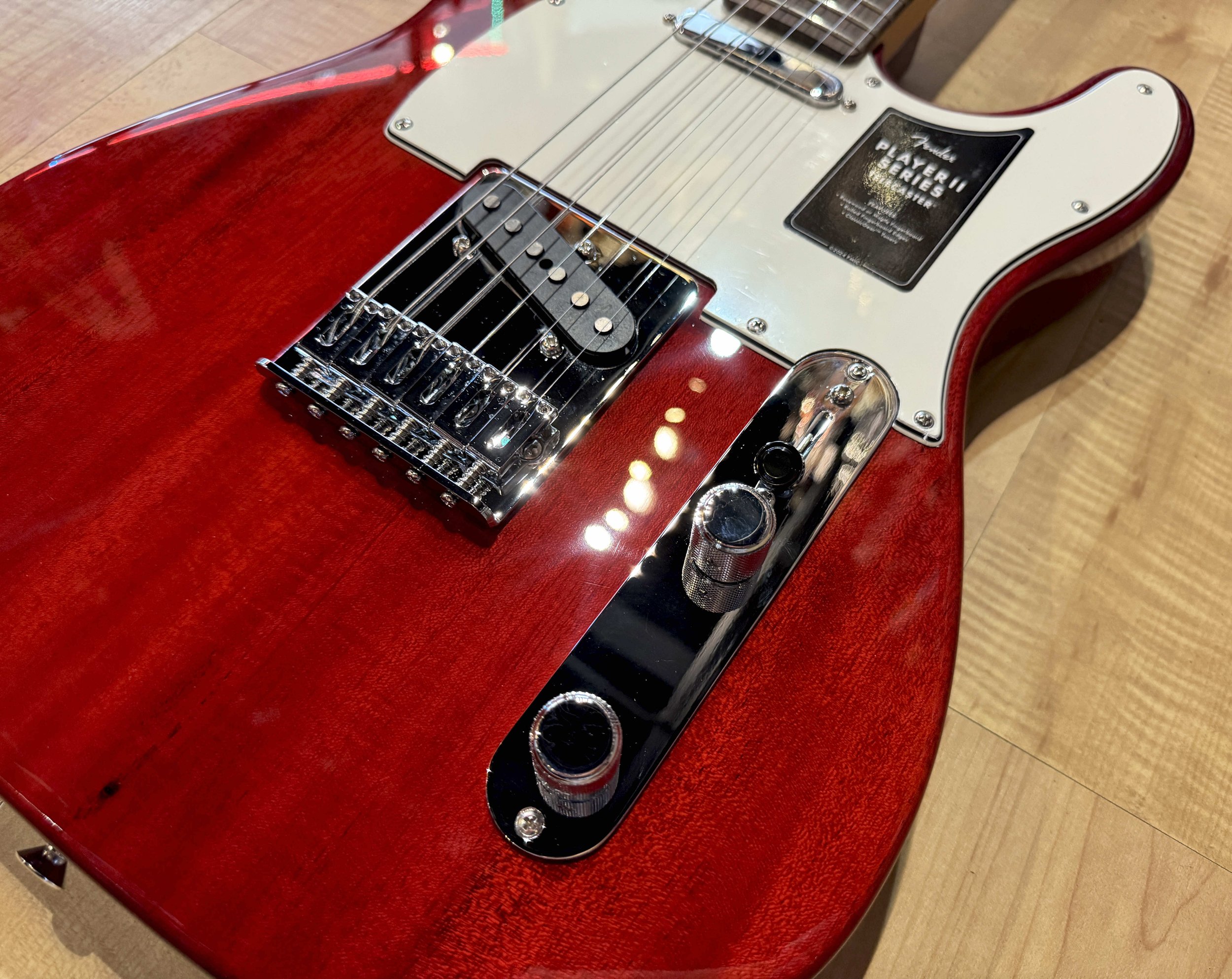 Controls of the Fender Player II Telecaster Chambered Electric Guitar In Transparent Cherry