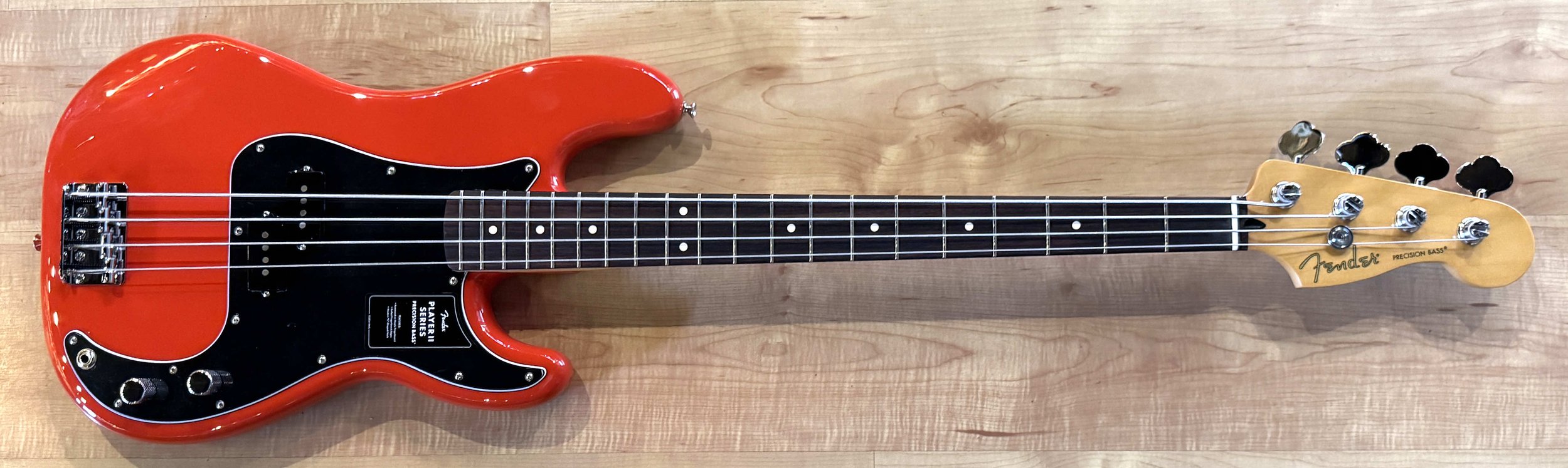 Front of the Fender Player II Precision Bass in Coral Red