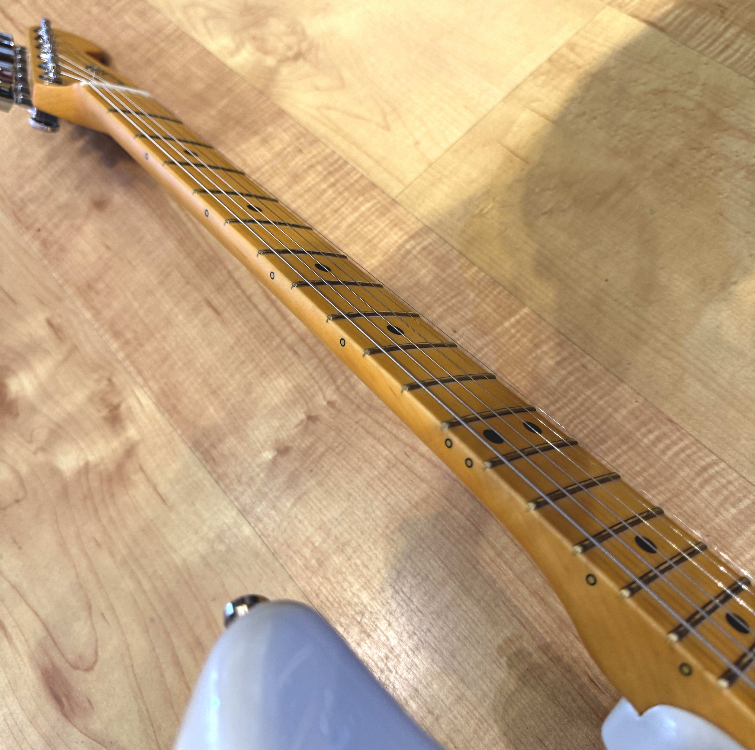 Side dots of the Fender American Ultra II Stratocaster Electric Guitar In Avalanche White