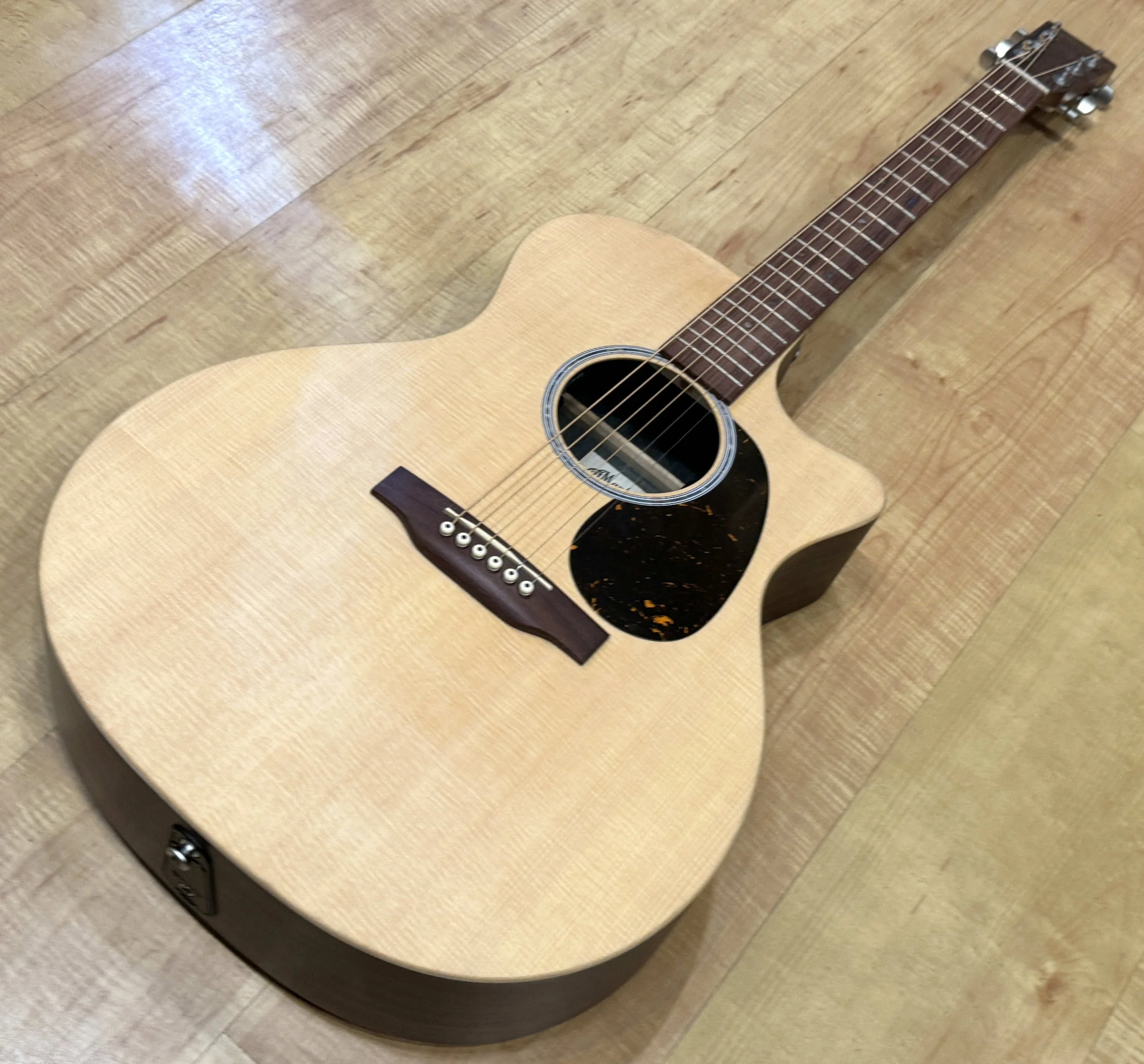 Full view of the Martin X-Series GPC-X2E Grand Performance Cutaway Acoustic Electric In Cocobolo