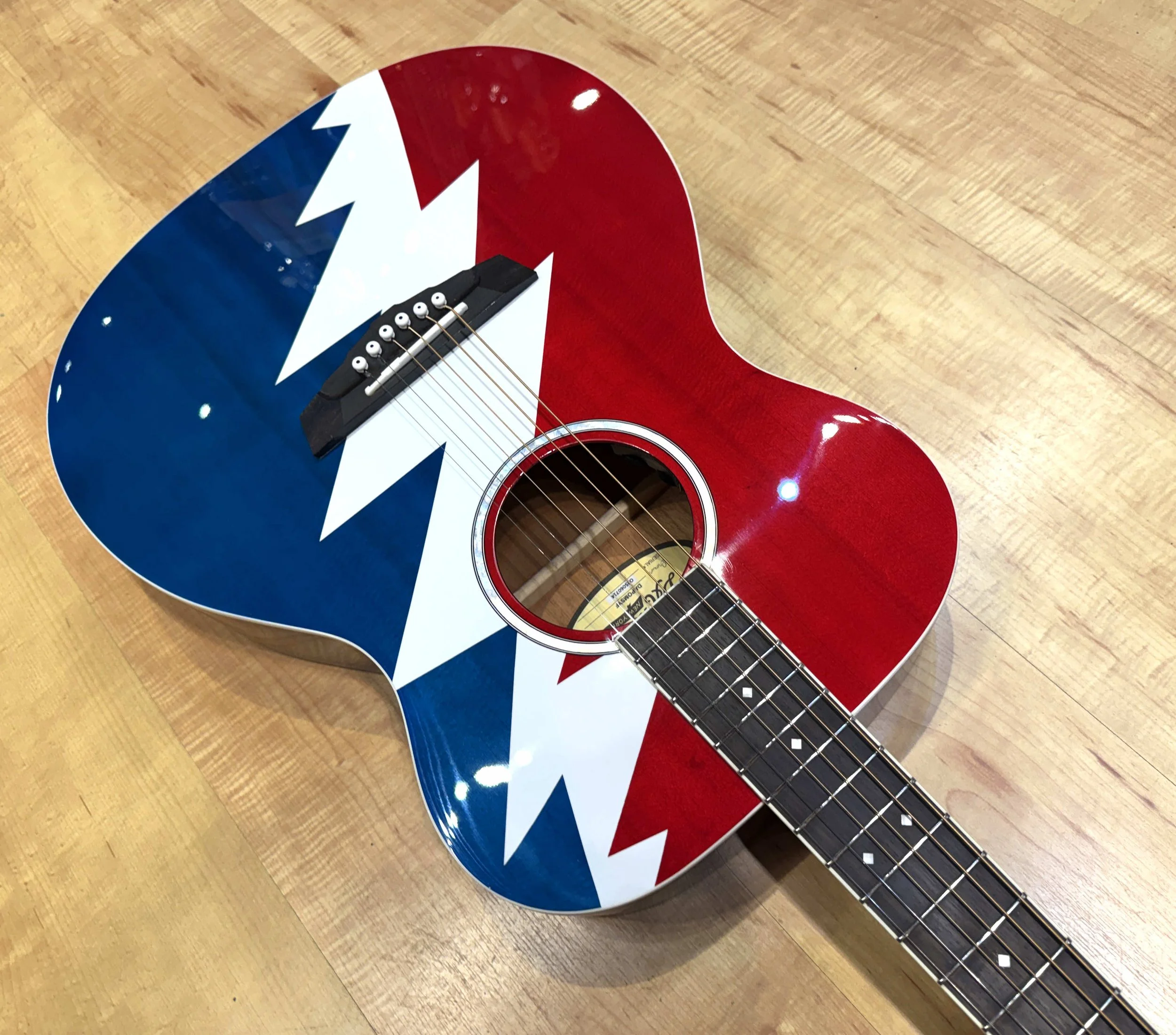 Corner view of the D'Angelico Grateful Dead Tammany Acoustic Electric Guitar