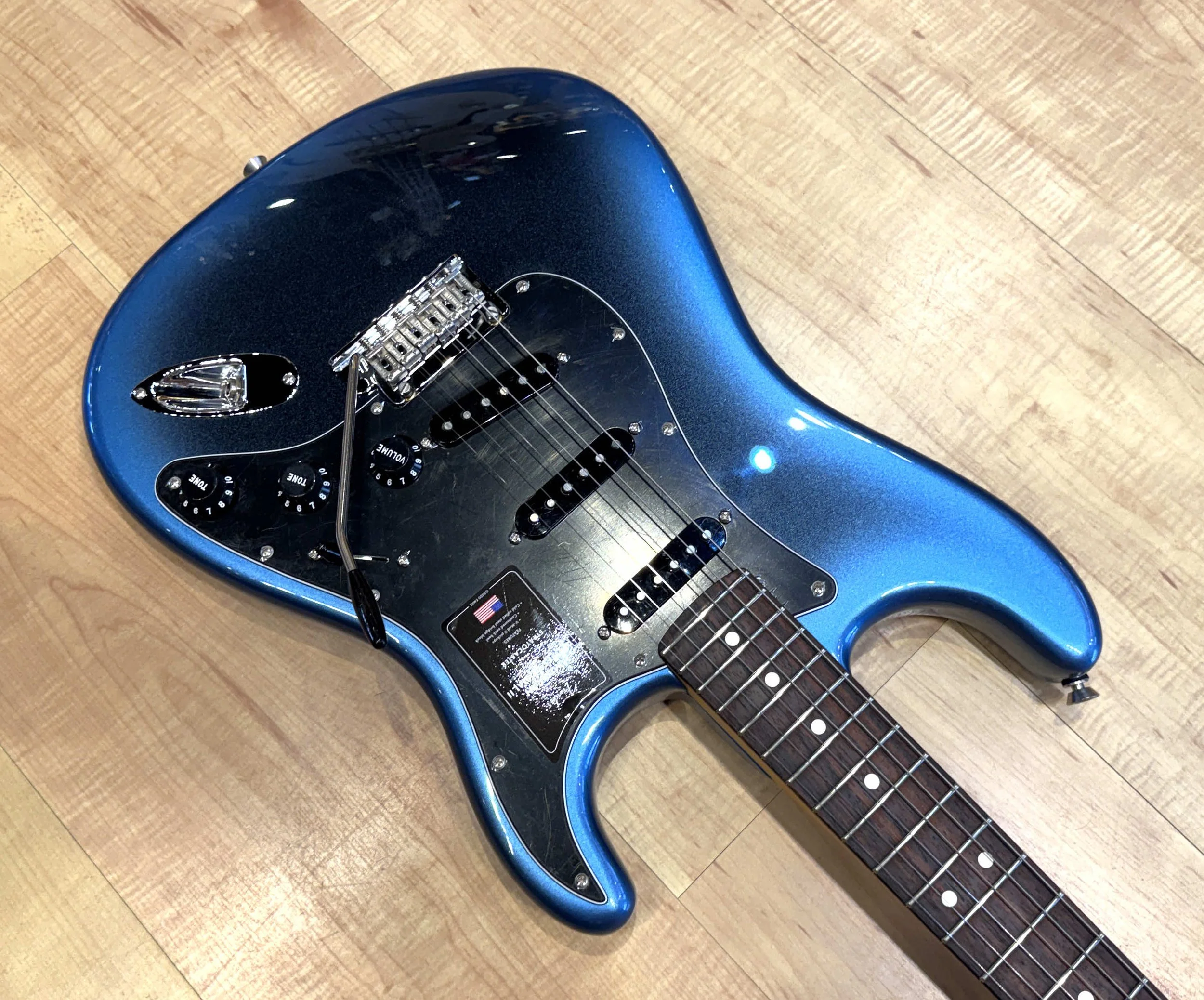 Pickguard of the Fender American Professional II Stratocaster Electric Guitar In Dark Night
