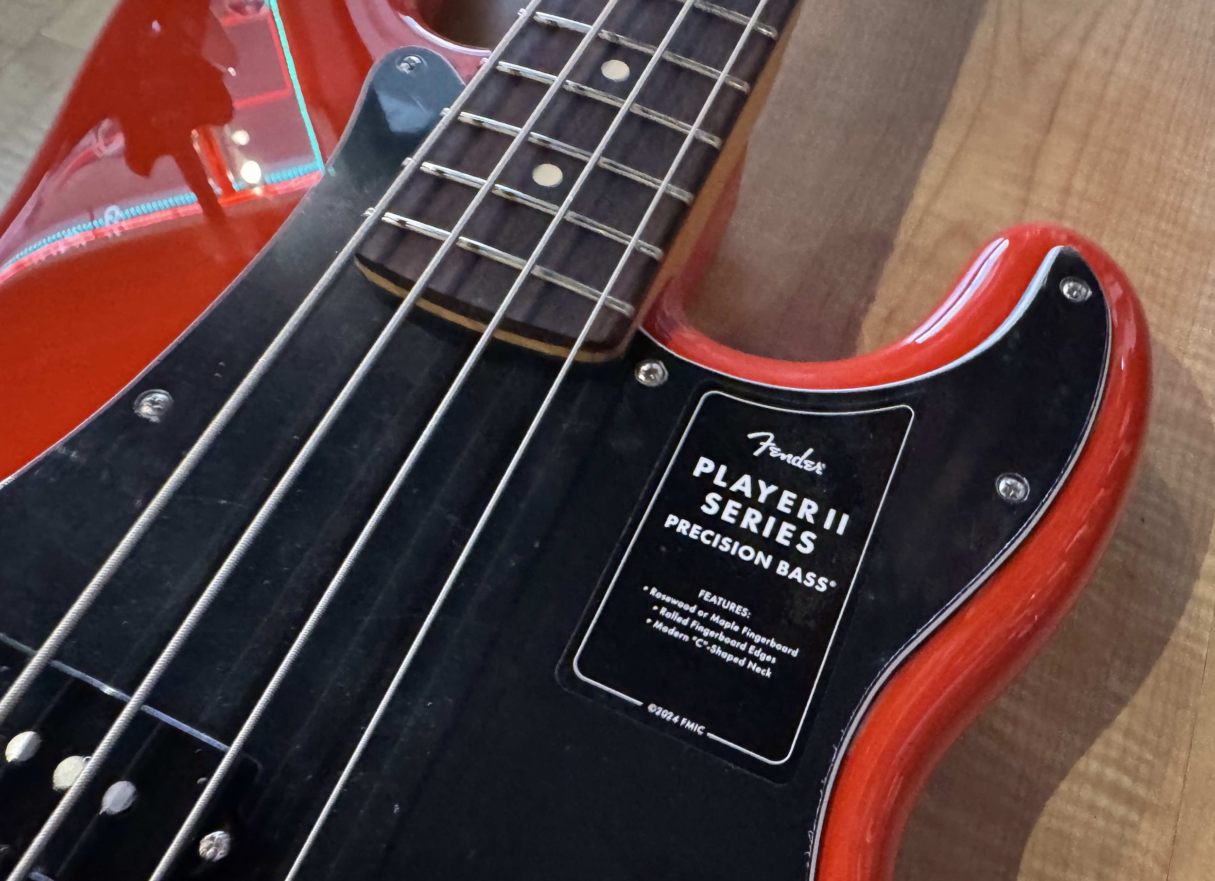 Sticker of the Fender Player II Precision Bass in Coral Red