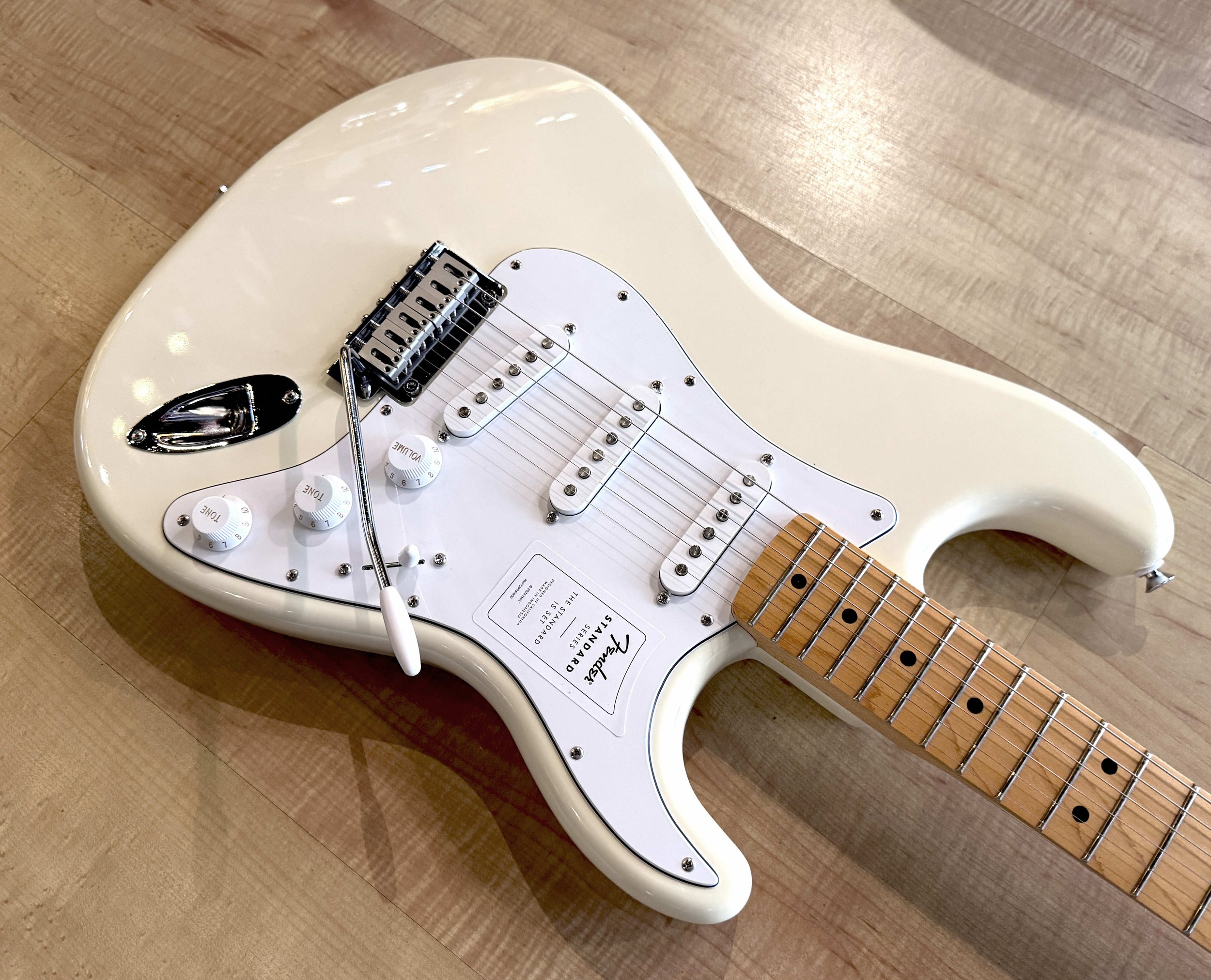 Pickguard of the Fender Standard Stratocaster Electric Guitar In Olympic White
