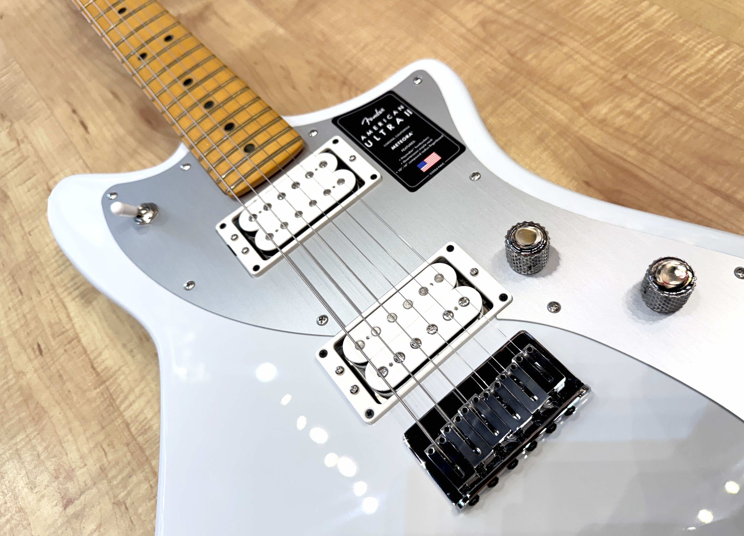 Bridge of the Fender American Ultra II Meteora Electric Guitar In Avalanche White