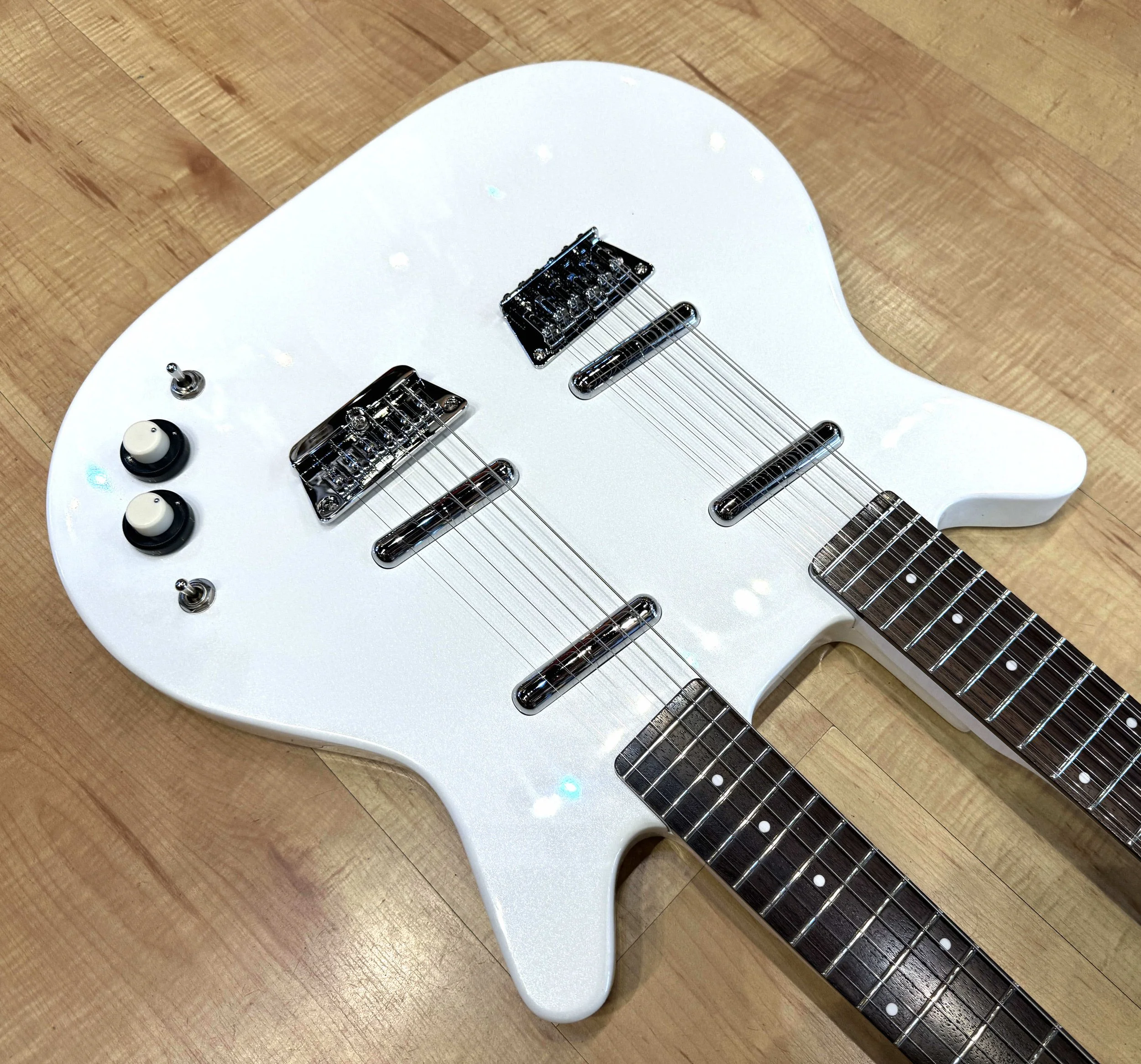 Hardware of the Danelectro Doubleneck 6/12 Electric Guitar In White Pearl