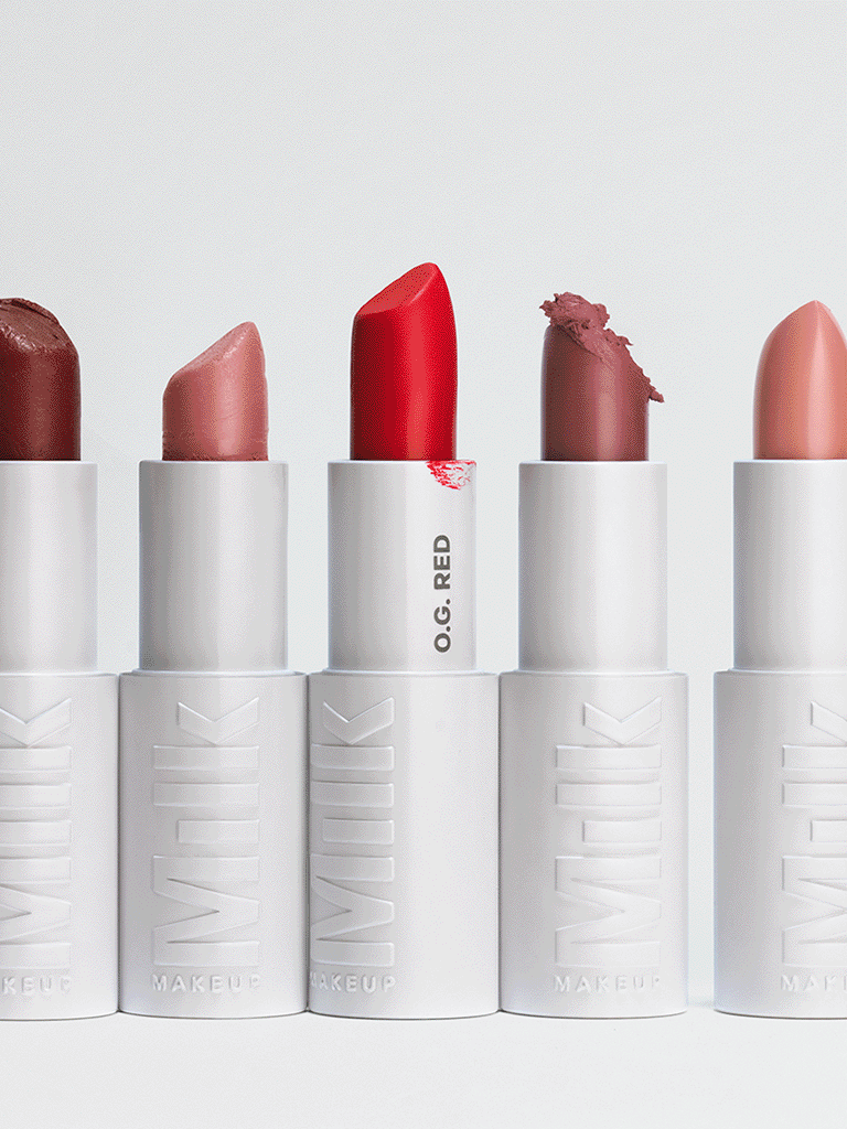 Five lipstick tubes in a row with different shades, with the middle one labeled 'O.G. RED'.