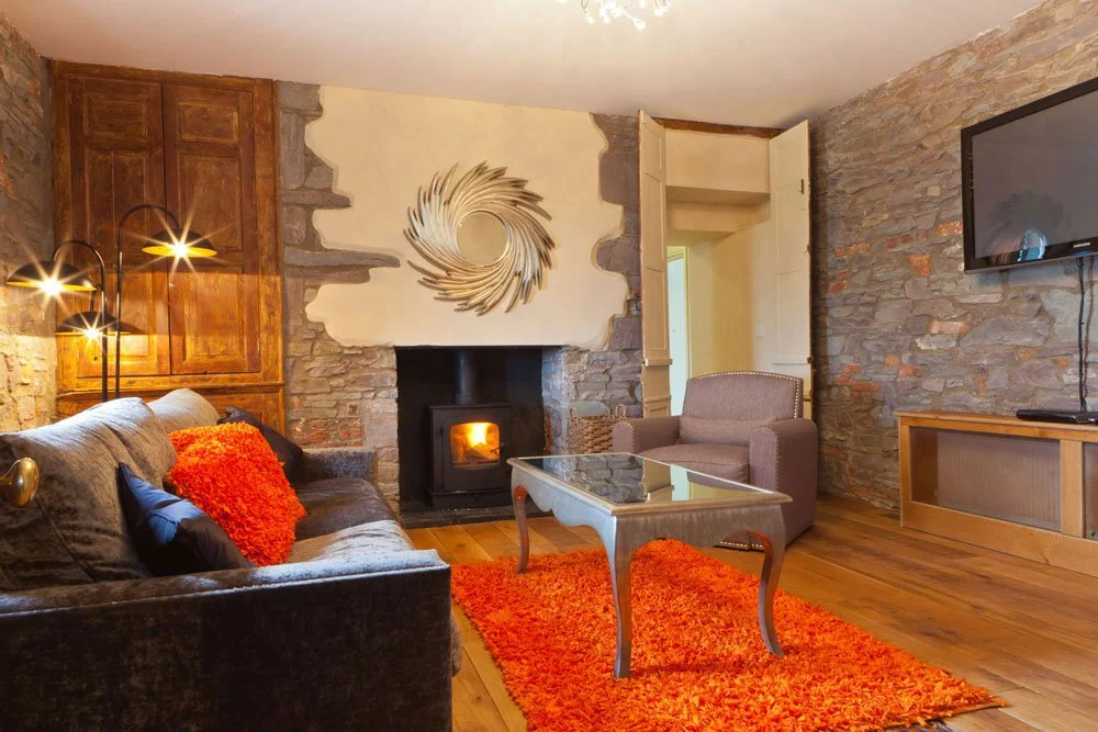 The Corran Resort and Spa Orange Rug Room Laugharne Architecture and Interiors
