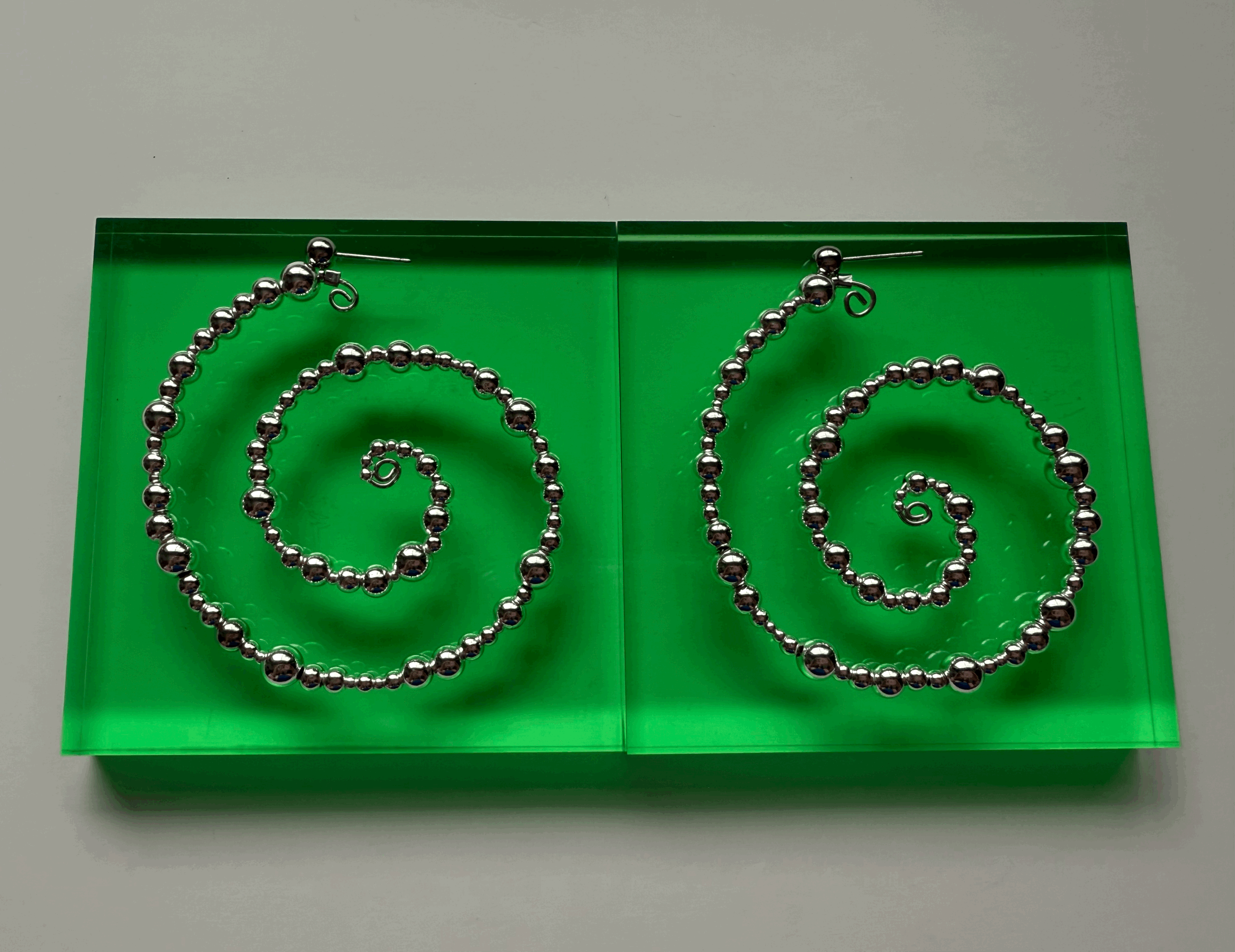 Silver Orbit Spiral Hoops