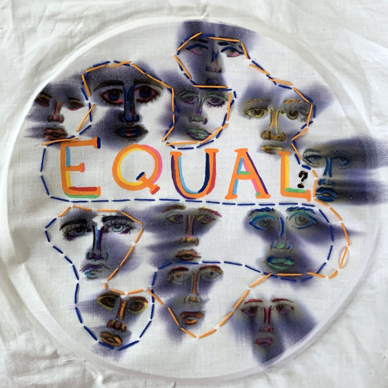 Chloe B.
"Equal"
I hoped to create an image that is fighting for equality. I drew faces in different colors to show that everyone is different, but they each deserve the equality that they yearn for. I later faded those faces with water to show tha