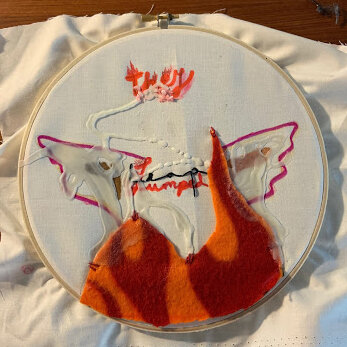 Rachel G.
I created an image of wings melting with wax above a flame. There are two hands emerging from the fire. The text “They Jumped” is also on fire, whereas “Leap” is embroidered in black. My process lead me to think of what materials complimen