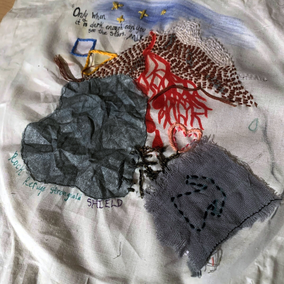 Xariah Chase
"Fallen People, Solid Rock"
My embroidery endeavor complimented the sojourn of reading Beloved by Toni Morrison. From the moment I read about “The Clearing”, I could sense that it wasn’t just a place, or a weekend escaped for the Black c