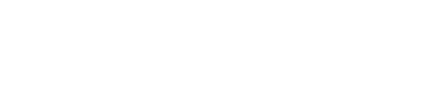 Close-up of the UPROXX logo in black and white.