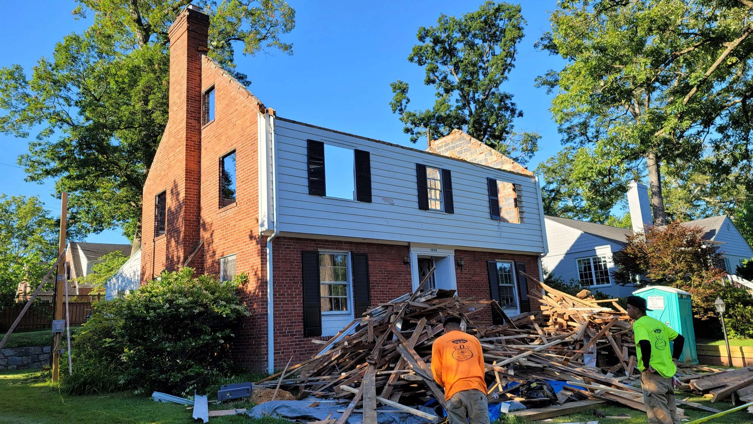 A partial residential demolition to prepare for expansion.