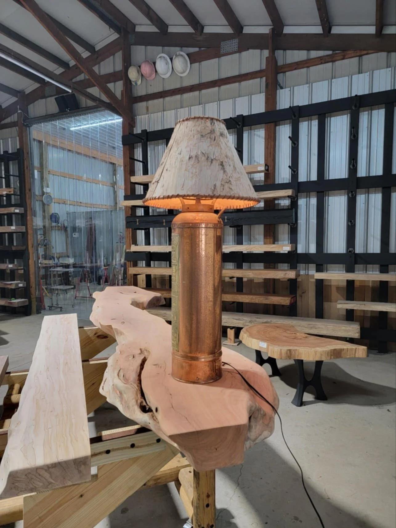 Copper lamp on Mesquite slab in showroom
