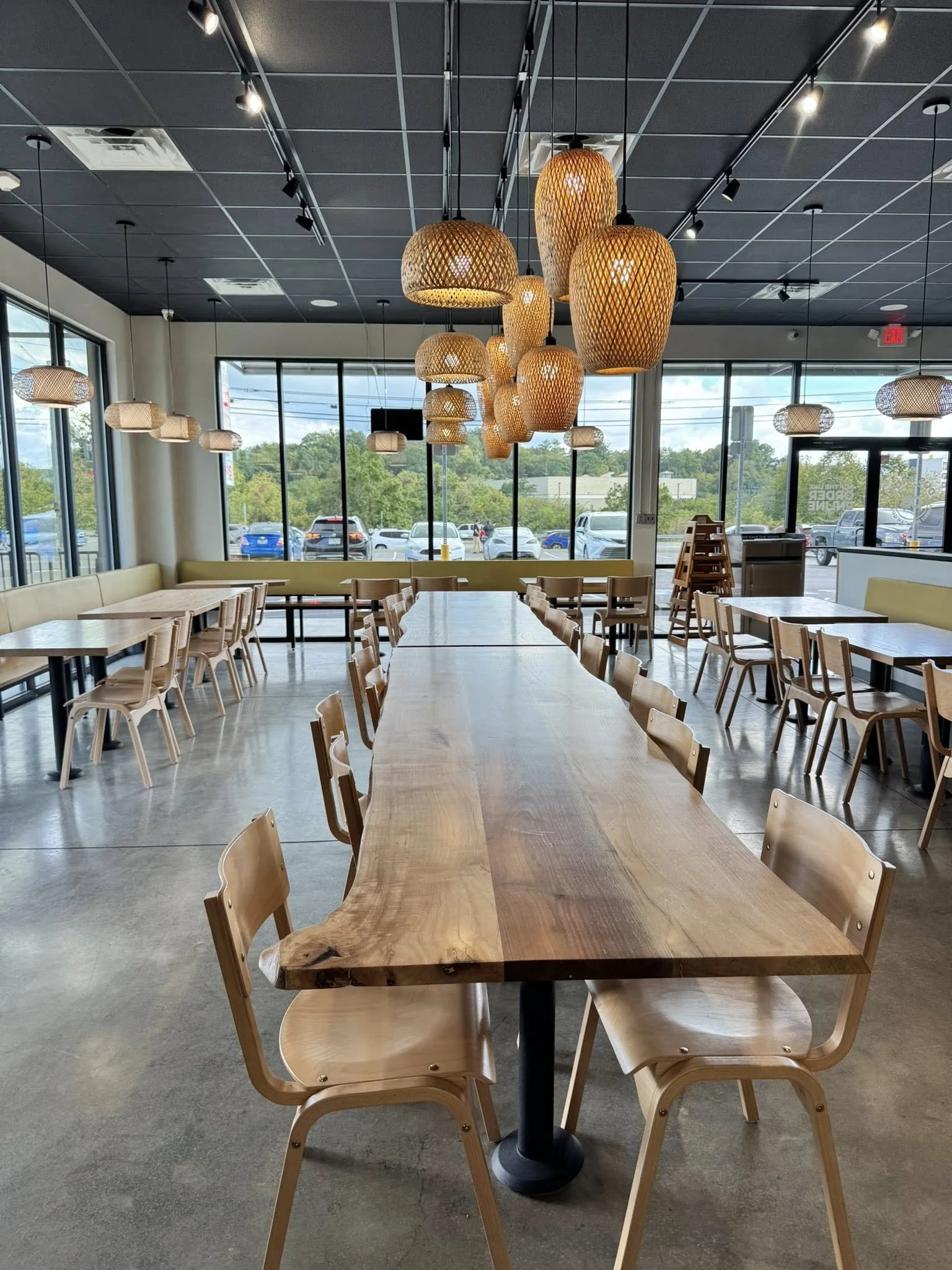 Two 10' Live Edge Tabletops, Pecan and Black Walnut slabs at Dos Bros in Sevierville, TN.