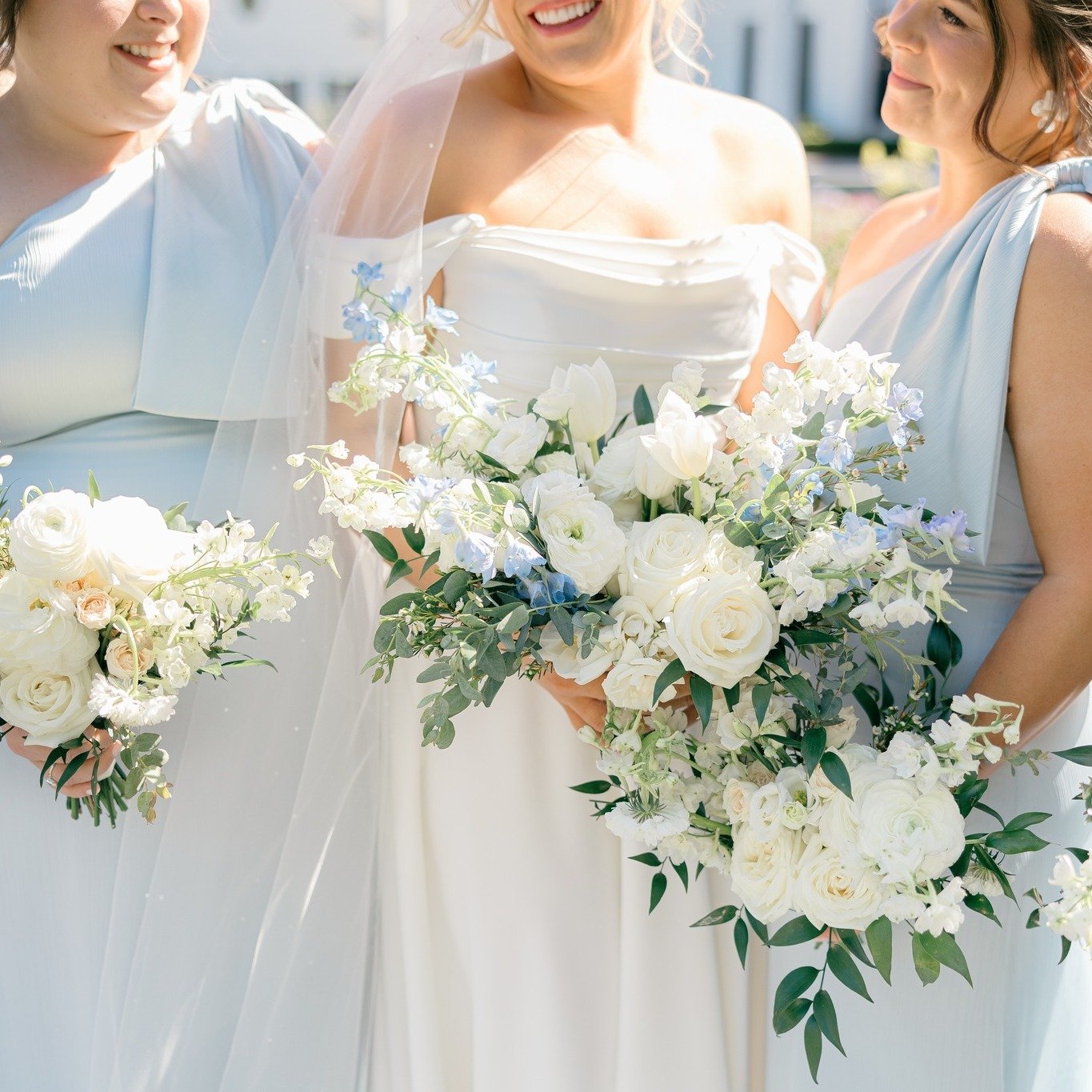 When it comes to your florals, you can never go wrong with a classic white and greenery combination, but if you're looking to elevate it just a touch more add in pops of &quot;something blue.&quot;

Venue: @country_club_of_landfall
Photography: @whit