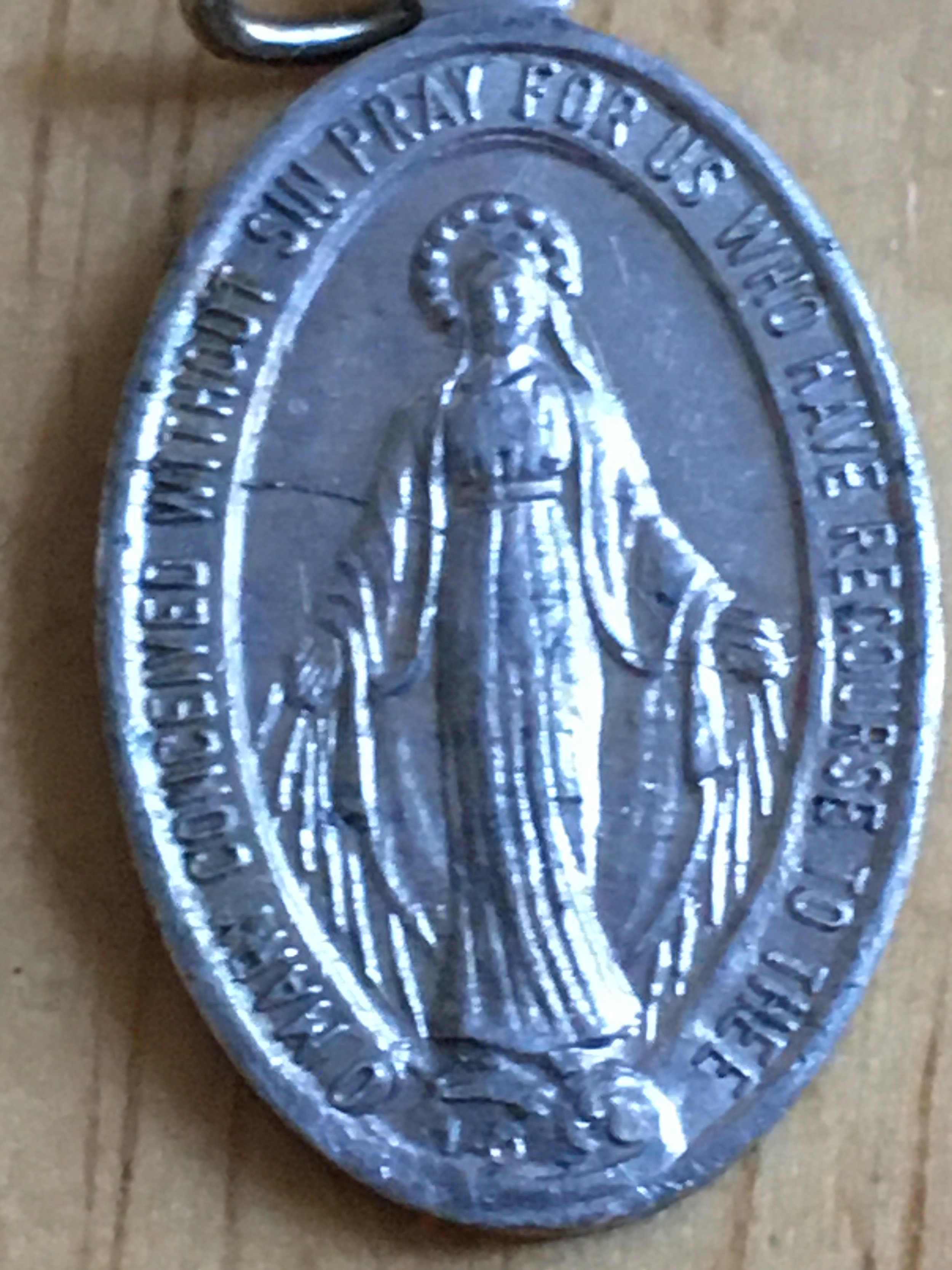 False Miraculous Medal — Sancta Mater Maria