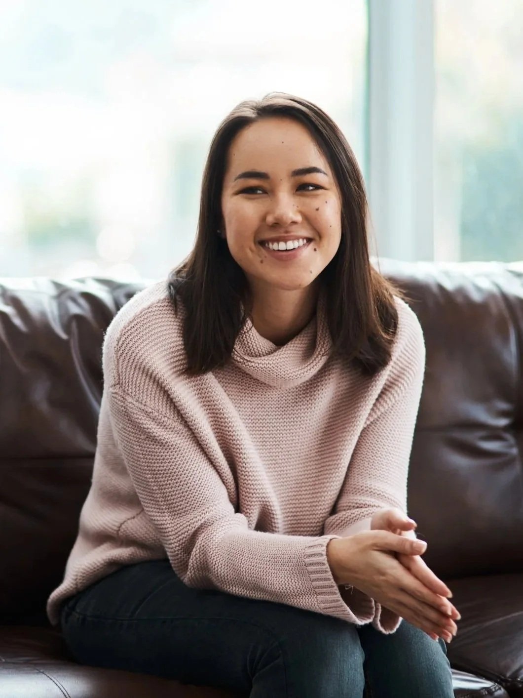 woman engaged in therapy discussing perfectionism and gaining relief after being understood by therapist