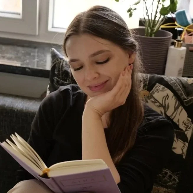 Woman walking through open field — nervous system healing and trauma therapy Texas