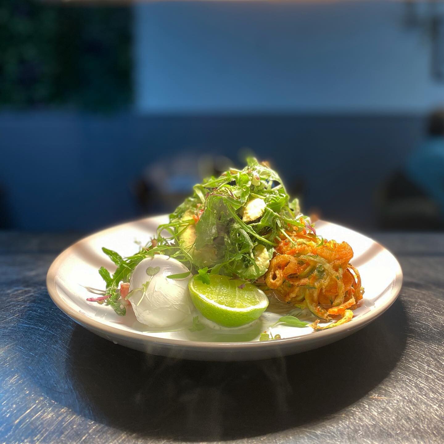 Zucchini &amp; carrot fritters w/ rocket salad, goats cheese, dill labneh + poached egg 😋 @beanseencafe