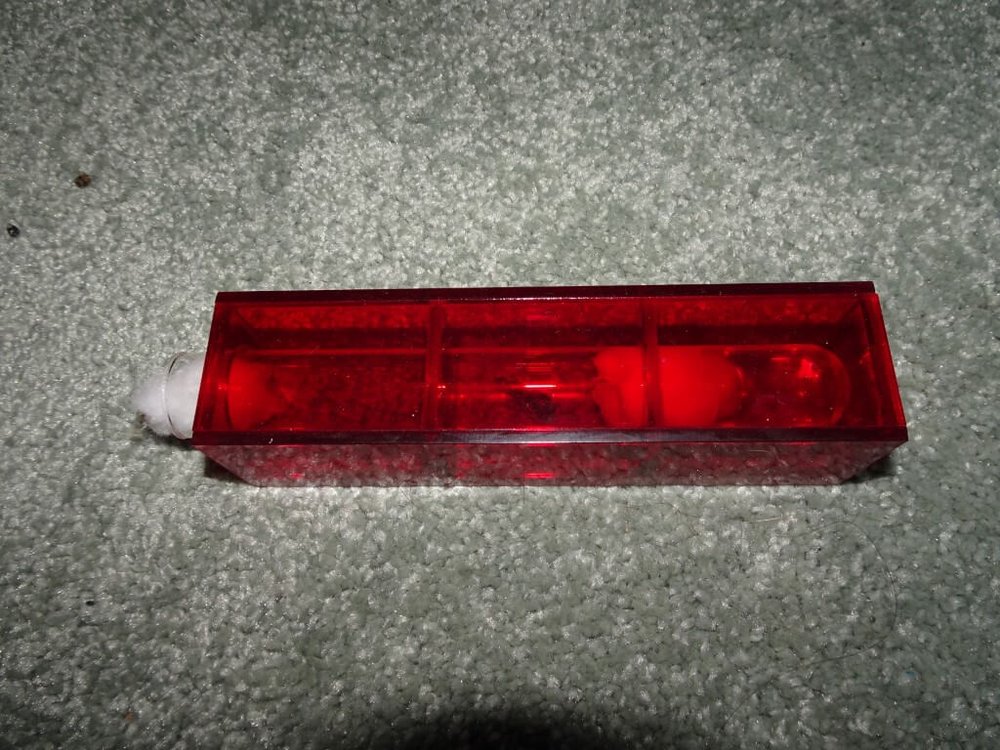 Test tube shielded with red Perspex