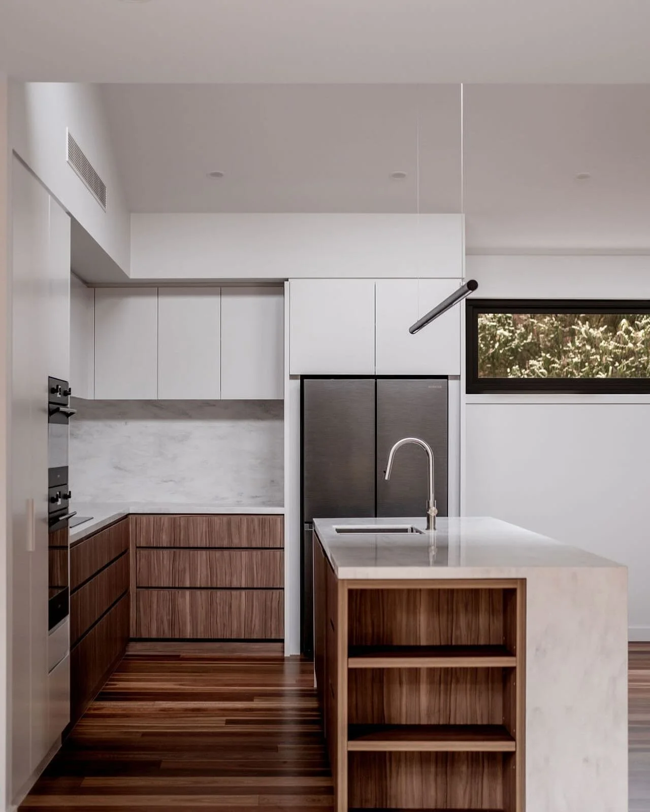 The warmth of walnut veneer and spotted gum flooring welcome you home to our recently completed Point Lonsdale house. Thanks to craftsmanship and skills @dohertybuildinggroup &amp; @sclkgeelong @newgroveaust  @stephmcglenchy