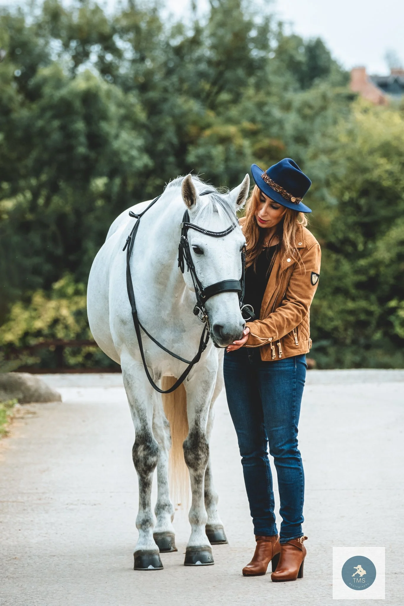 Pari with her Lusitano gelding Ferrari during an equine portrait session at Pickering Grange in Leicestershire