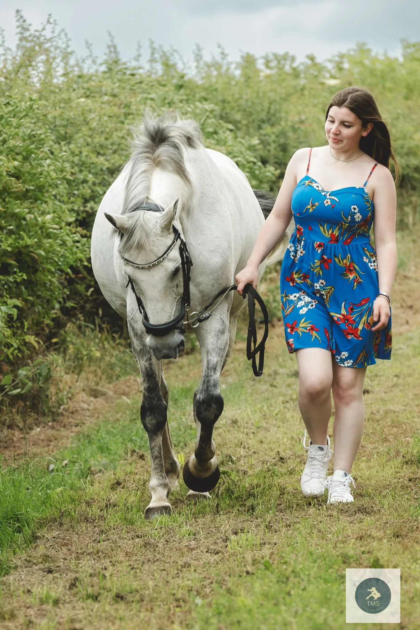 Liv walking with Milly through the Derbyshire countryside