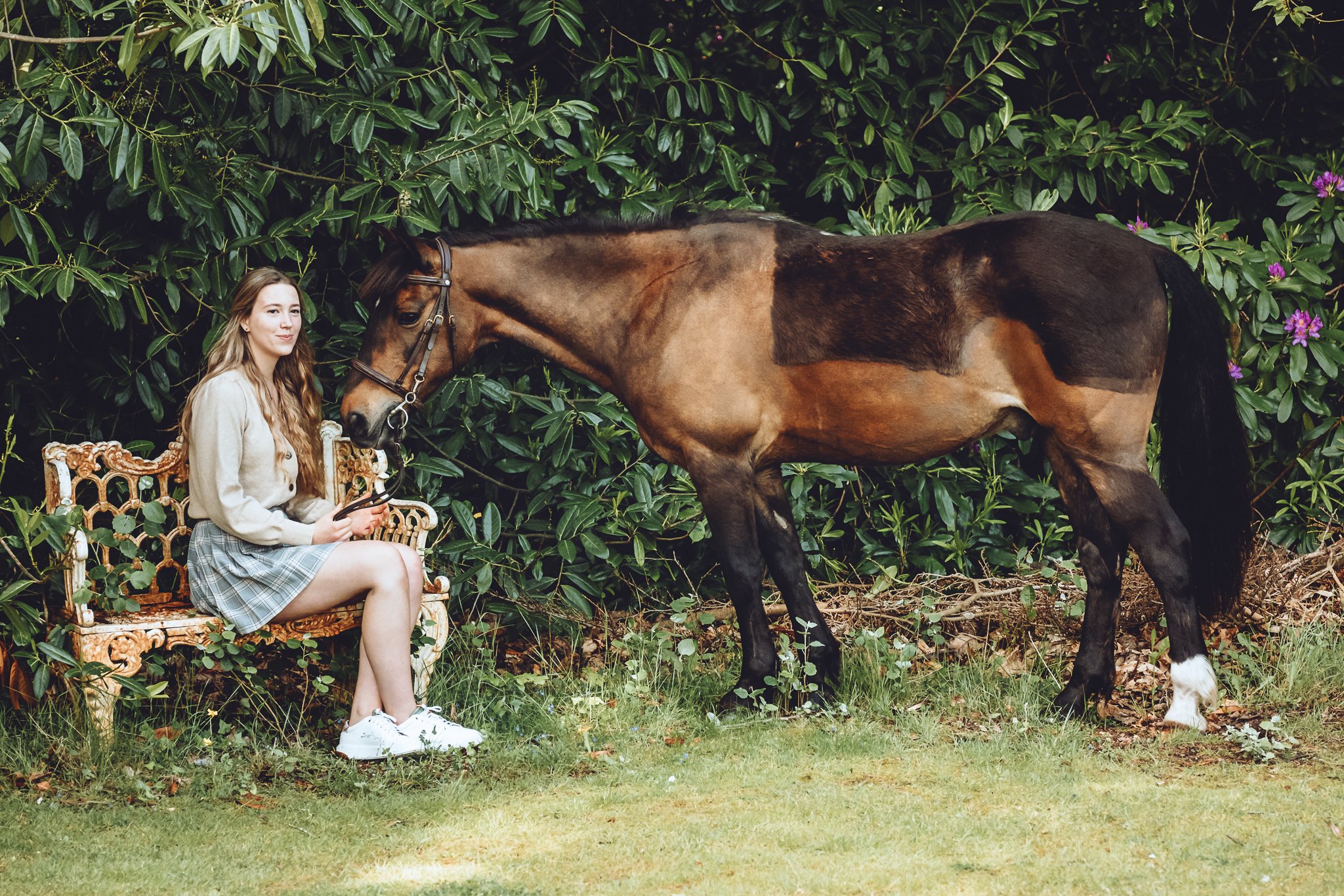 Young rider with bay roan pony in the New Forest
