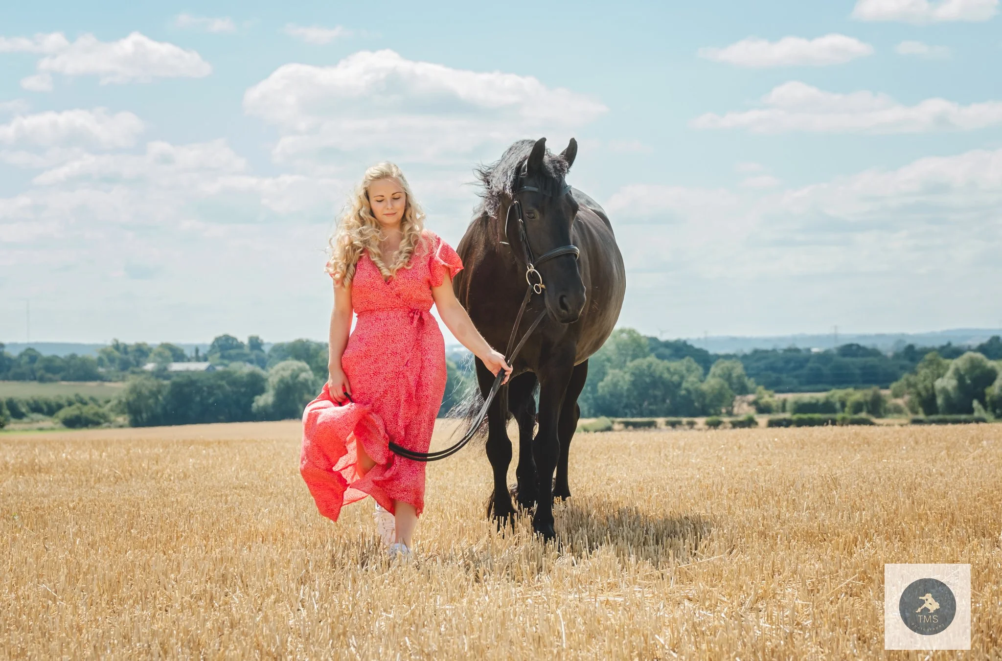 Olivia and Moike together during a Friesian horse and owner photoshoot