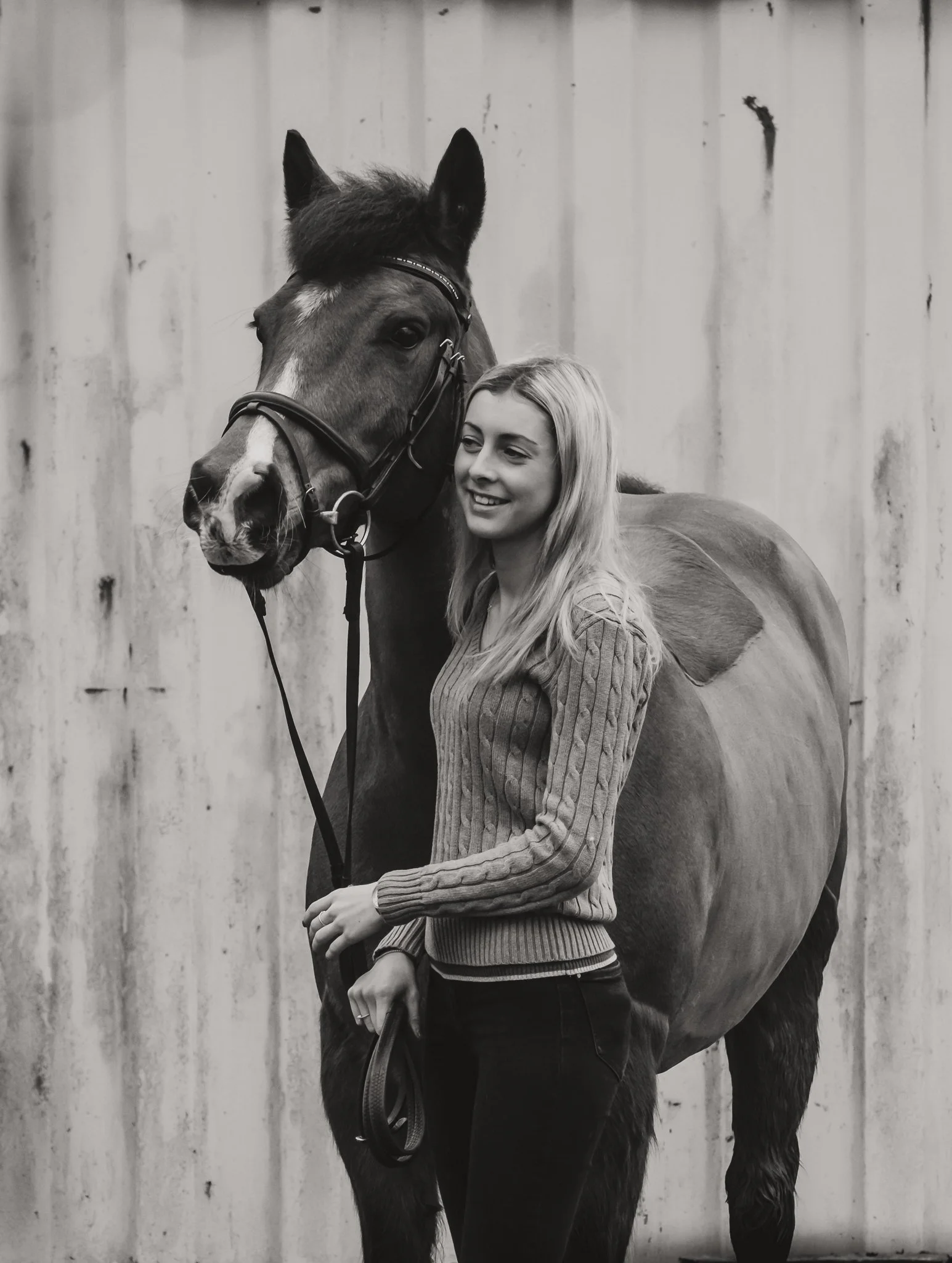 Natural equine portrait of woman with pony Koda