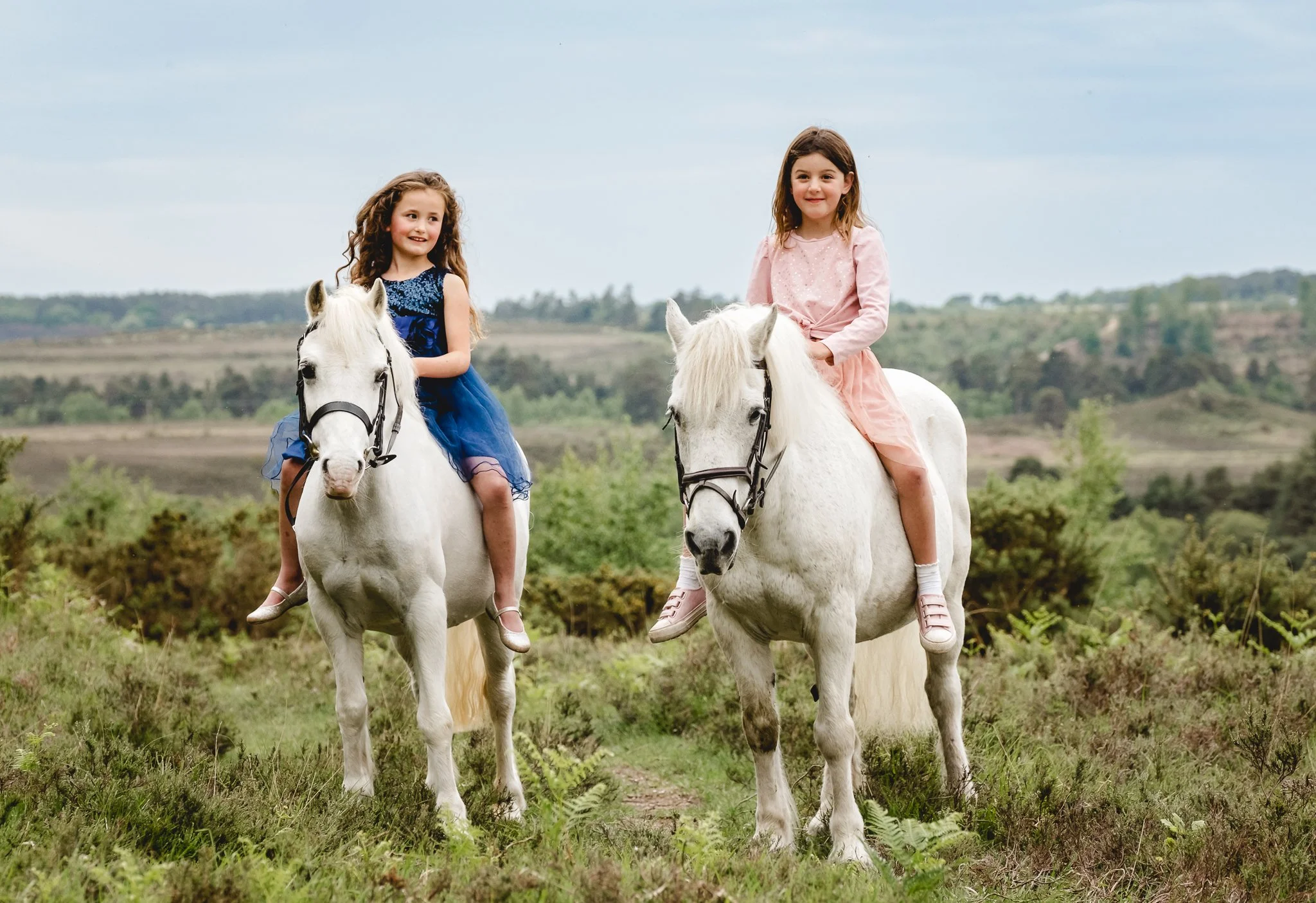 best friends with their Welsh ponies in the New Forest