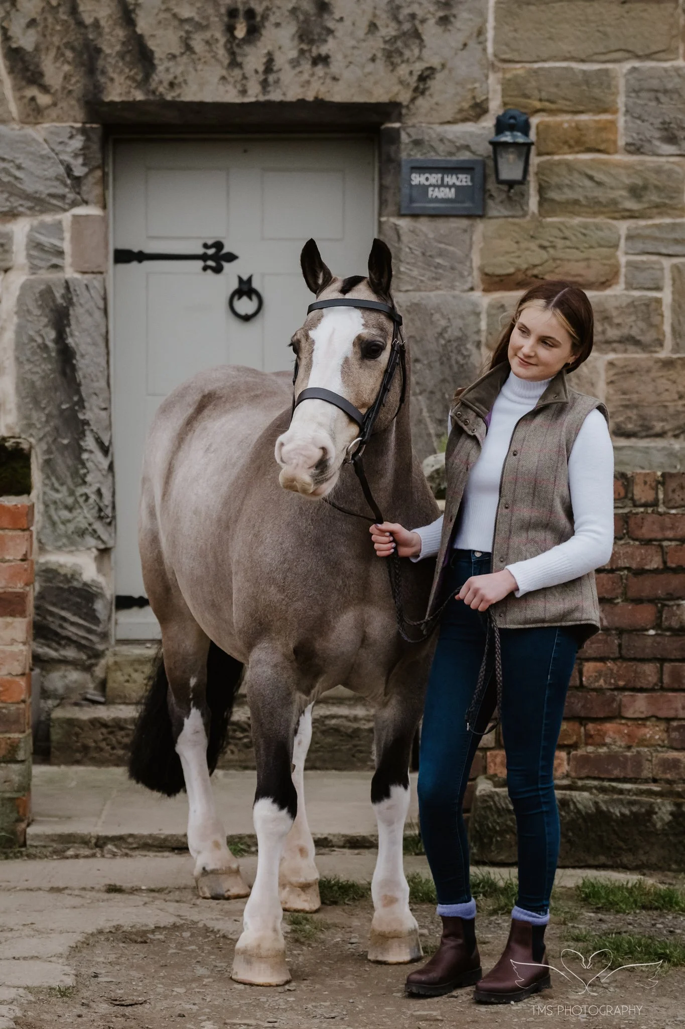 Holly and her pony Del-Boy outside the family home