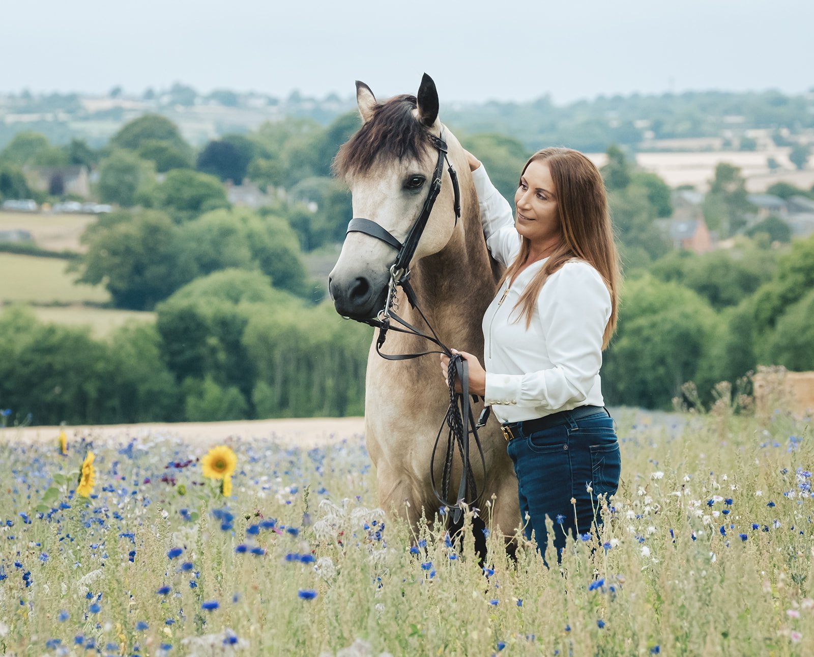 Horse and owner portrait in Derbyshire wildflower meadow