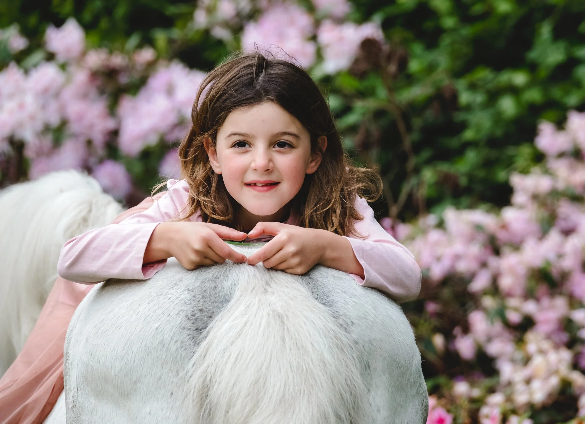 A child with her heart pony