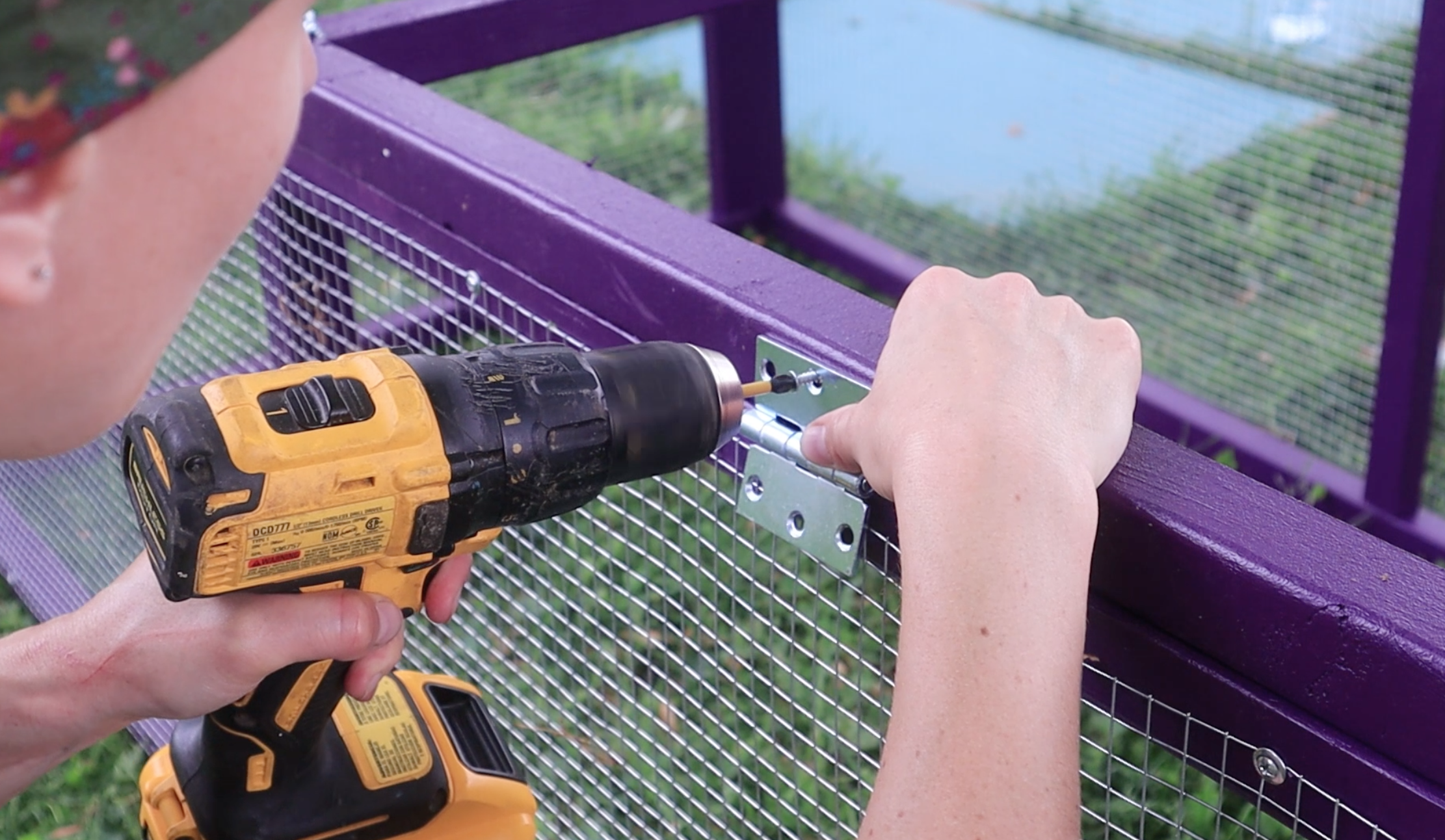 Attach the roof frame to the tractor using hinges