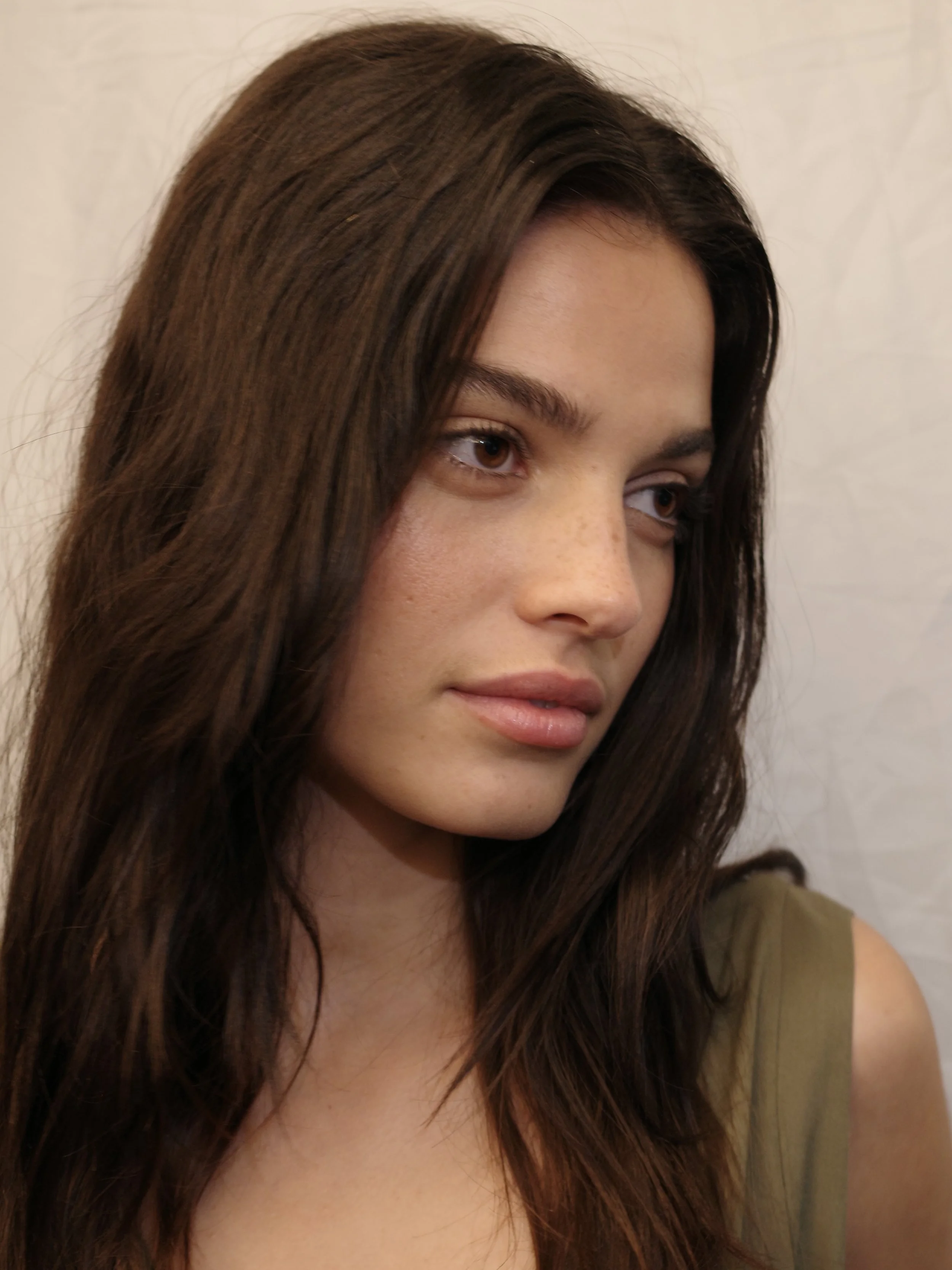 Behind the scenes of a fashion e-commerce photoshoot in San Francisco Bay Area featuring European Spanish woman 25 years old with glowy, radiant skin and natural makeup by Angela Shippen.