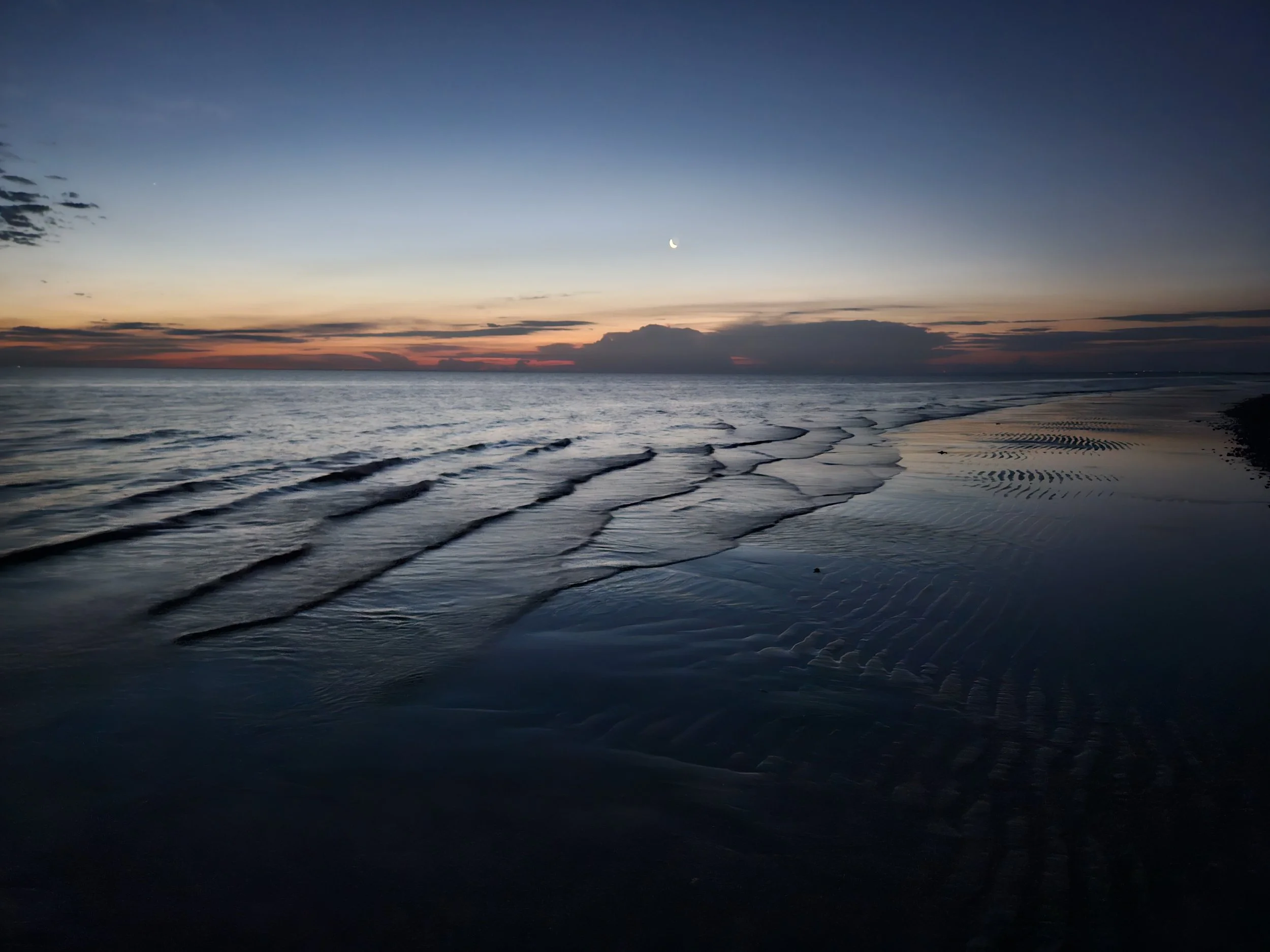 Sunrise on a Cape Cod beach at low tide, symbolizing mindfulness, nervous system healing, and living in the present moment.