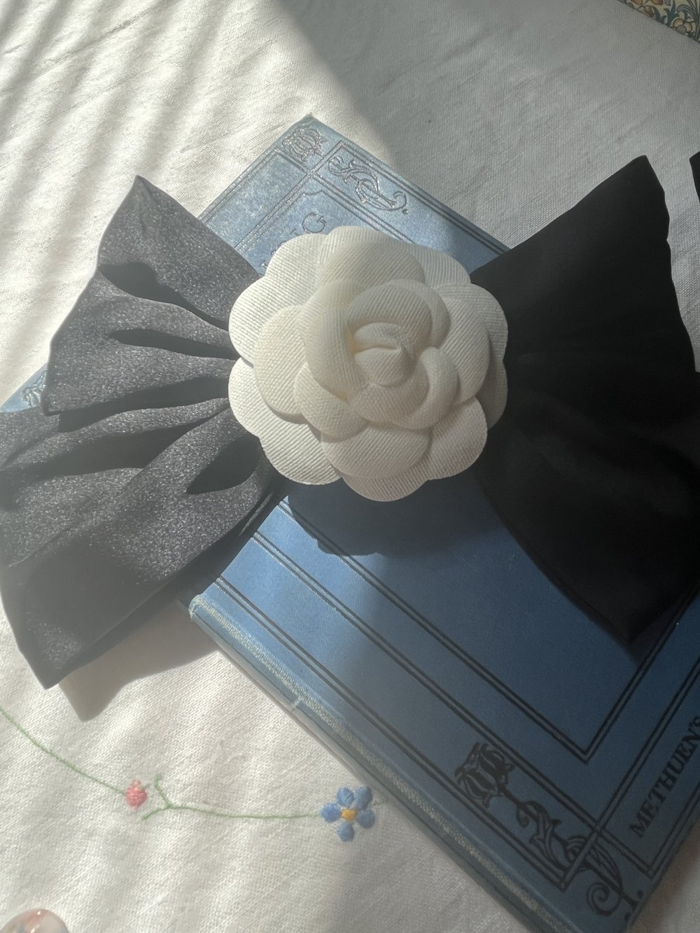 Chanel Camélia White Flower on black satin bow — The Year of Juniper