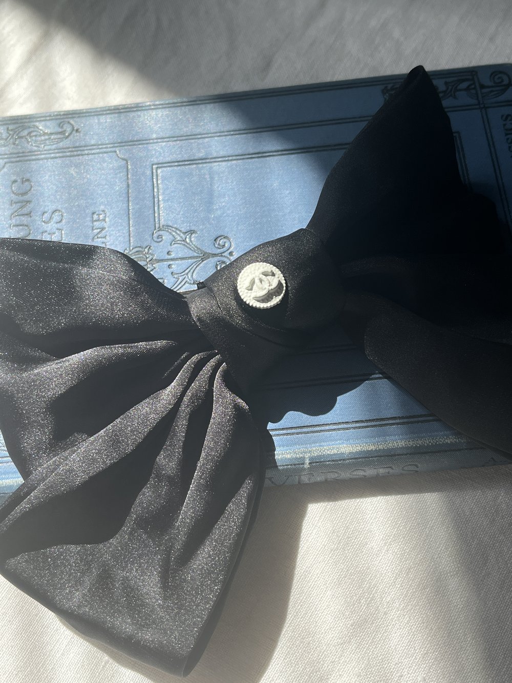 Chanel Small White on black satin bow — The Year of Juniper