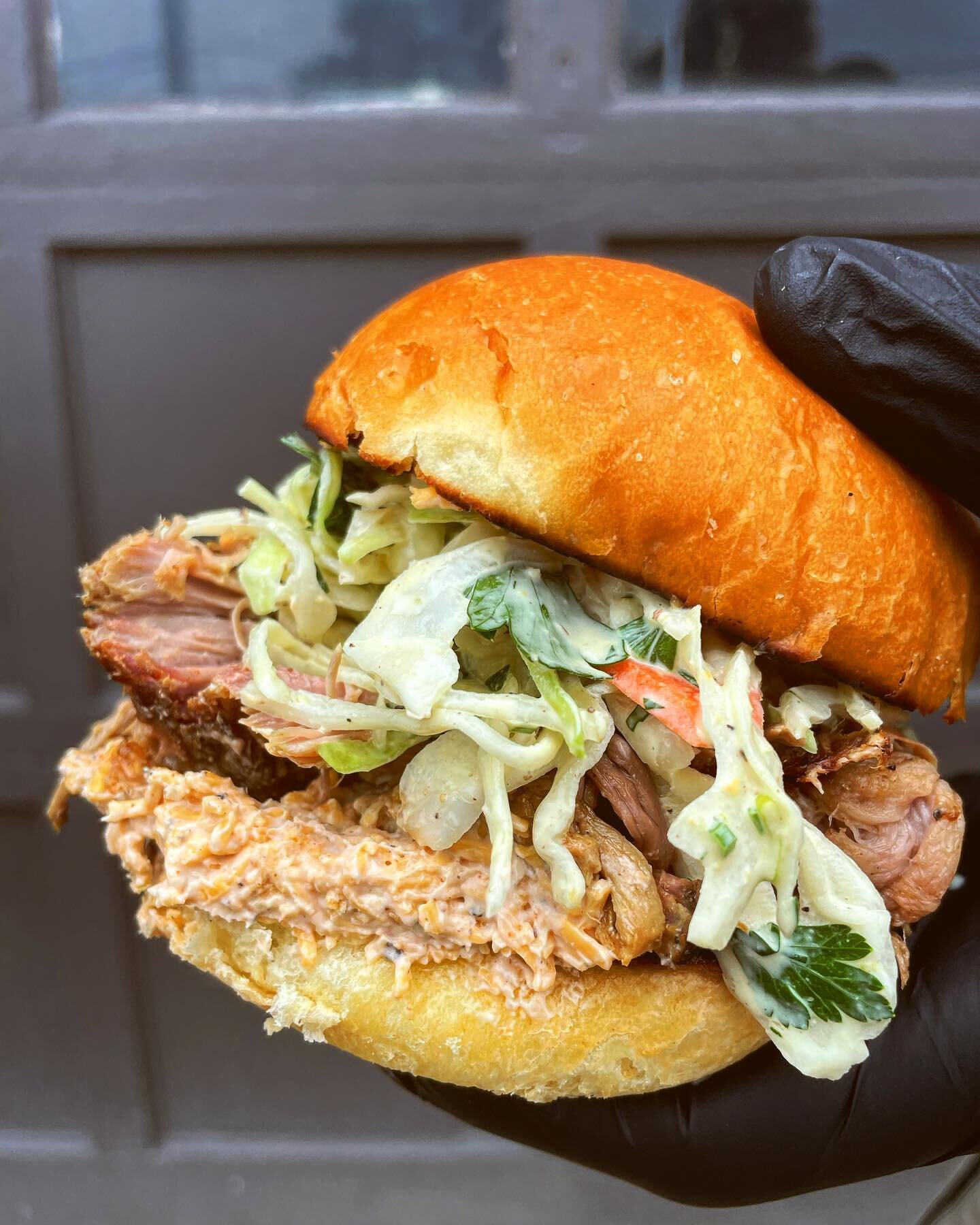 OKTOBERFEST at @urbanrestbrewing is one of our favorite days of the year. Bratwurst, warm potato salad, ramp butter wings, and this amazing smoked pork shoulder sandwich from @detroitbbq with our hot mustard slaw and beer cheese spread are on our men