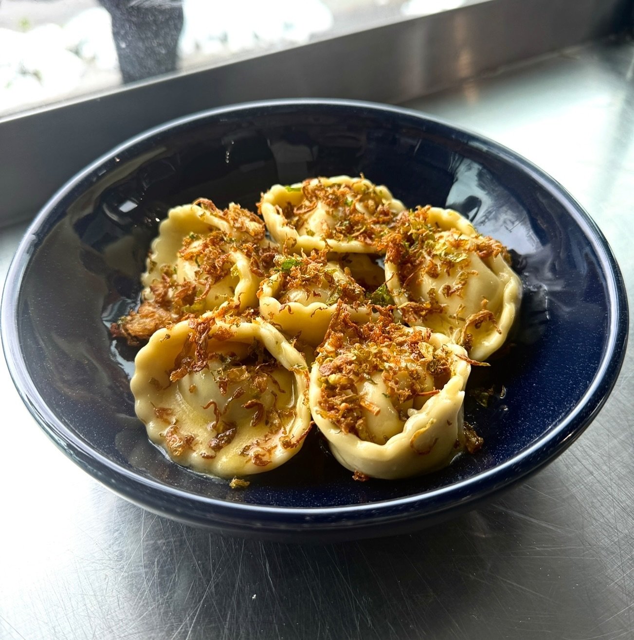 Testing testing 🍝 Lemon Ricotta Cappelleti with a lemon butter sauce and crispy shaved brussel sprouts.