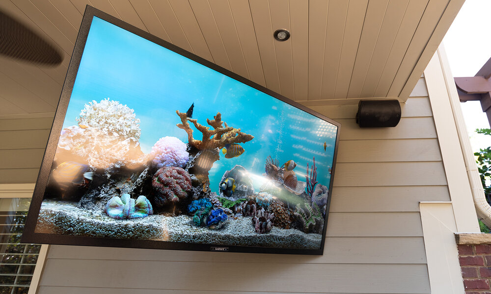 You may be wondering if an outdoor tv is worth the investment. Adding a television to your outdoor space can provide so much entertainment value. When you want to have friends over, you have so much more space to entertain when you can take it outsi…