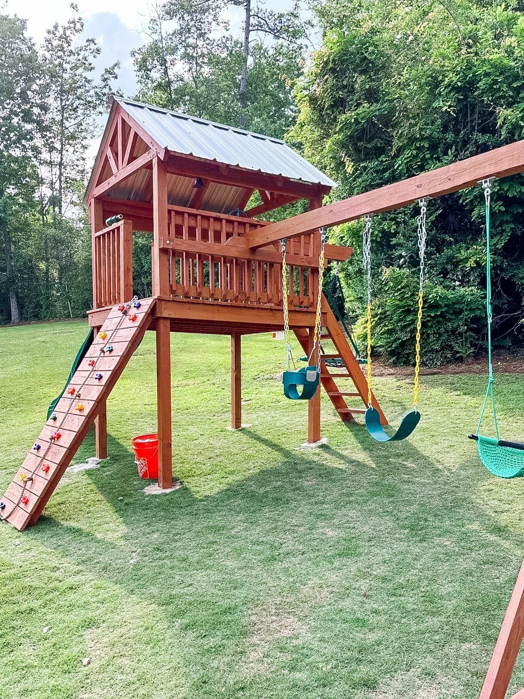 Fresh stain brings outdoor structures back to life. This playset went from weathered and faded to protected and vibrant, ready for years of use.

We stain decks, fences, pergolas, and playsets throughout Mountain Brook, Vestavia, and Homewood. If you